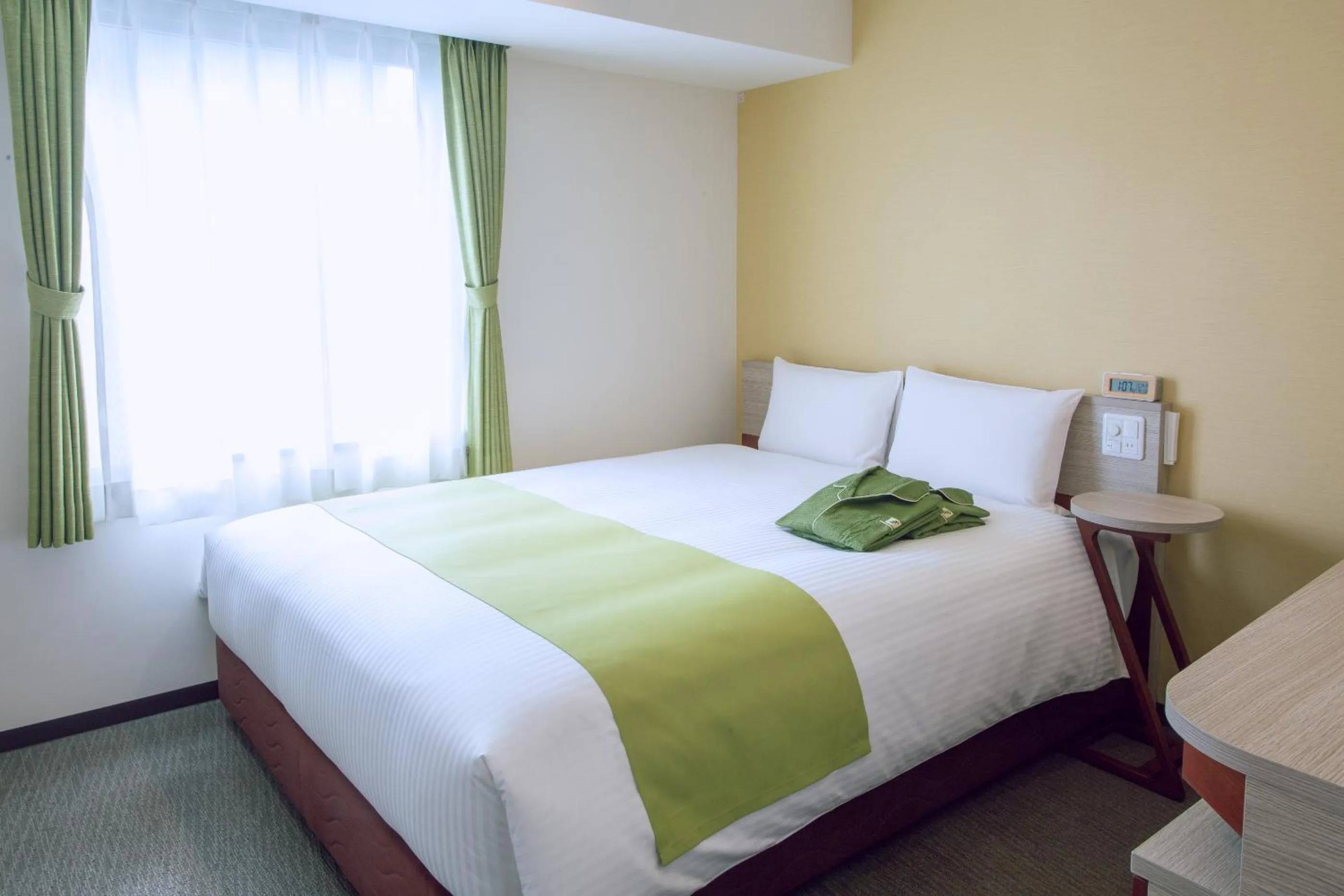 Bed in Kuretake Inn Premium Meieki minami