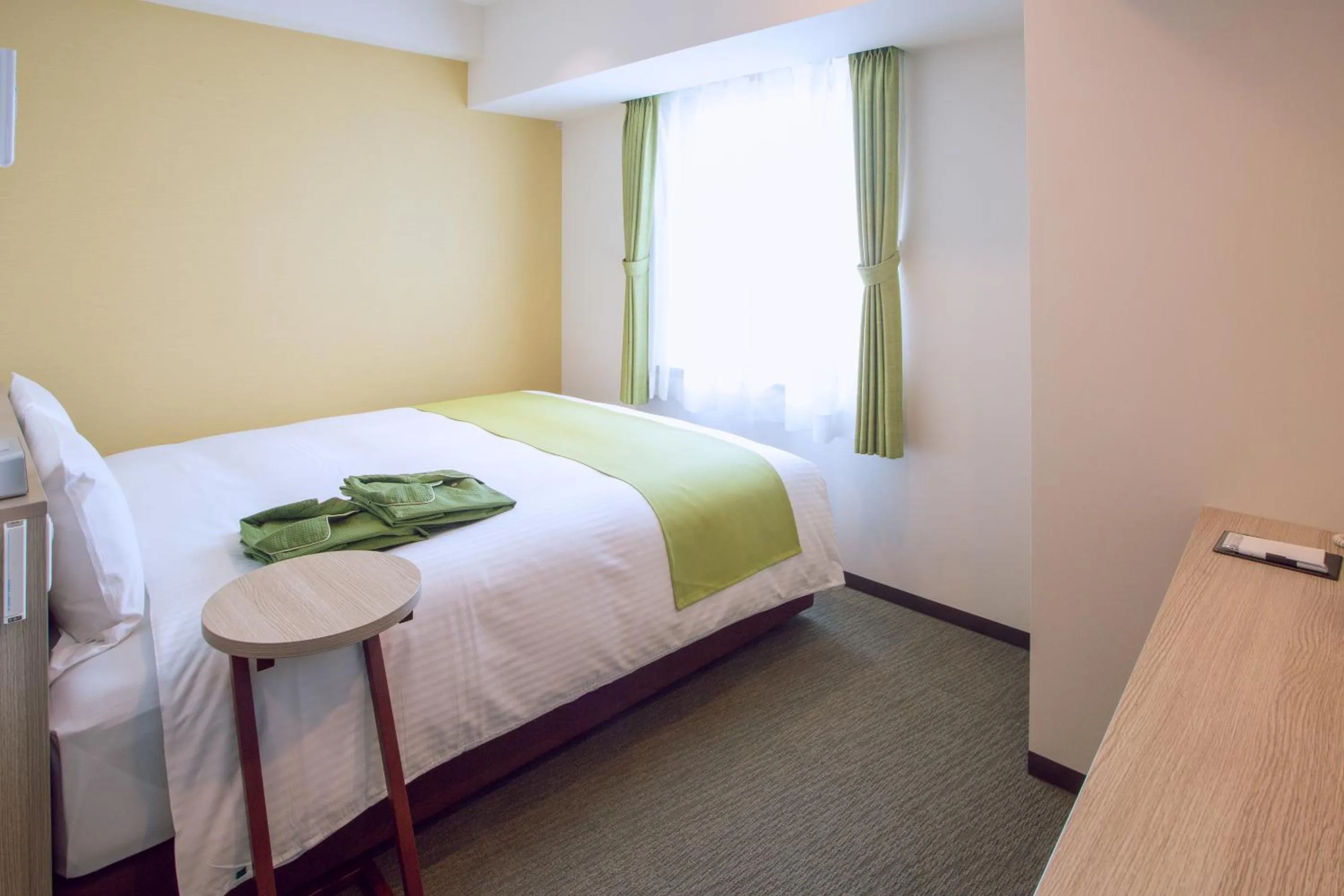 Bed in Kuretake Inn Premium Meieki minami