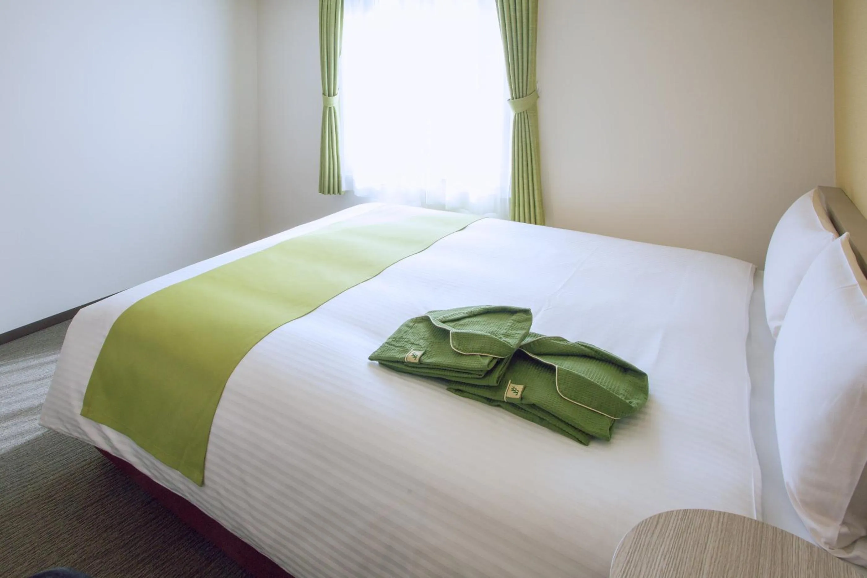 Bed in Kuretake Inn Premium Meieki minami