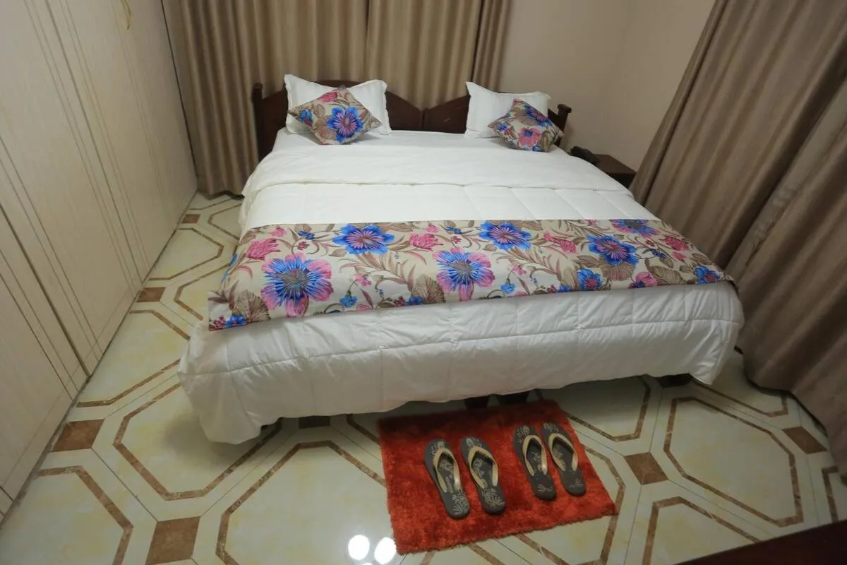 Bedroom, Bed in Precious Villas Lubowa