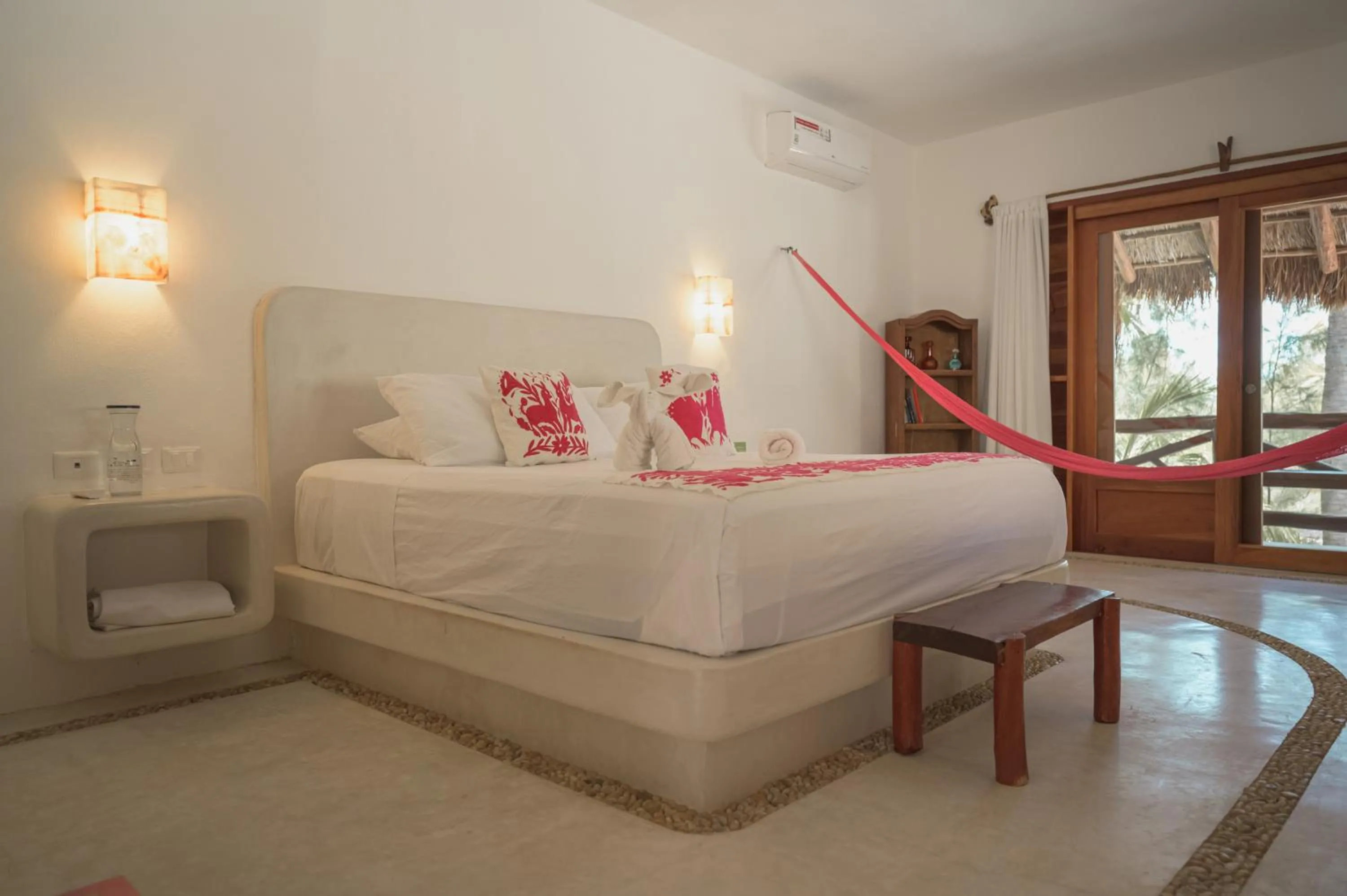 Bed in Casa Iguana Holbox - Beachfront Hotel
