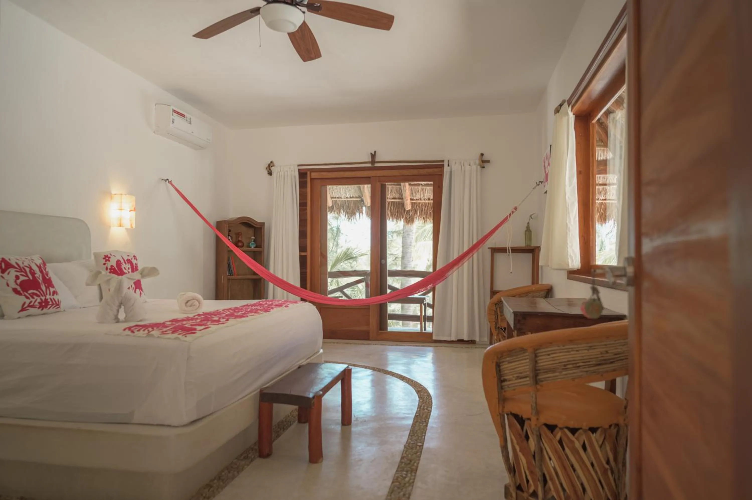 Bed in Casa Iguana Holbox - Beachfront Hotel