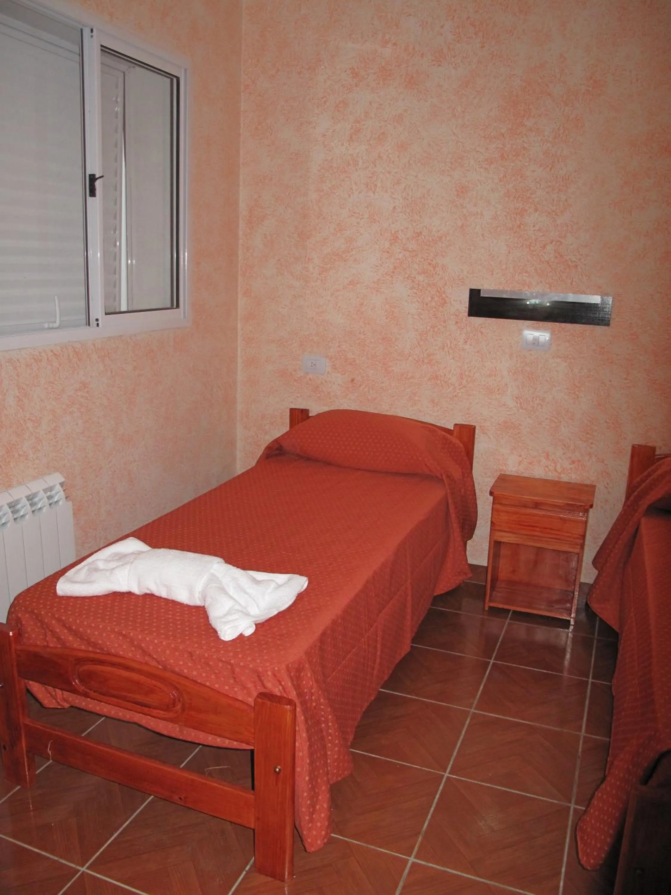 Bed in Hotel Los Cedros