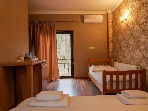 Bed in Wald Hotel Lagodekhi Rooms