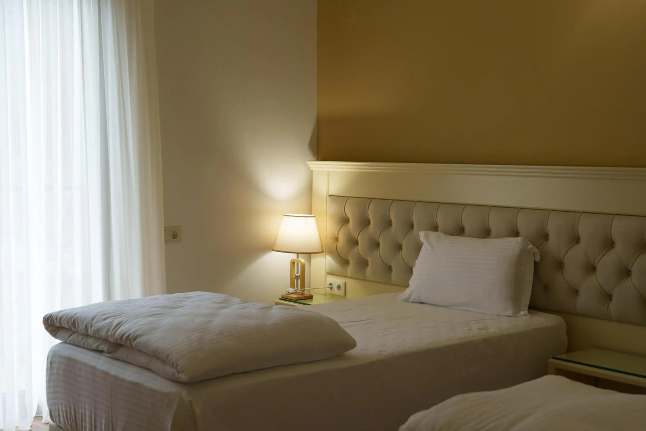 Bed in Wald Hotel Lagodekhi Rooms