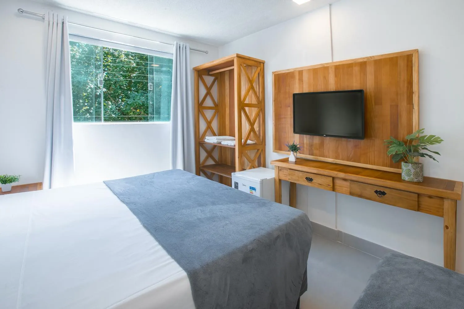 Bed in Hotel Cajueiro Guarujá