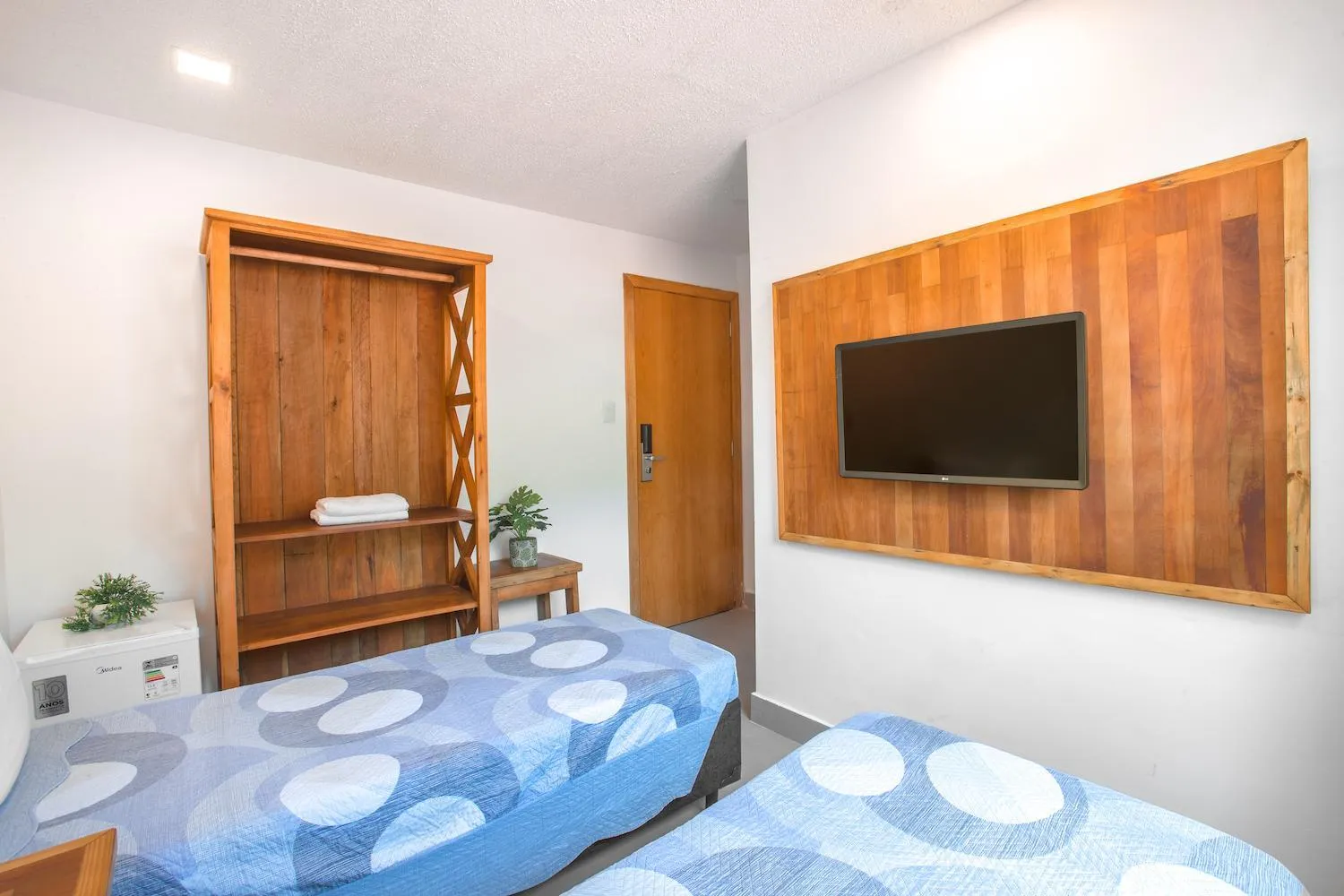 Bed in Hotel Cajueiro Guarujá