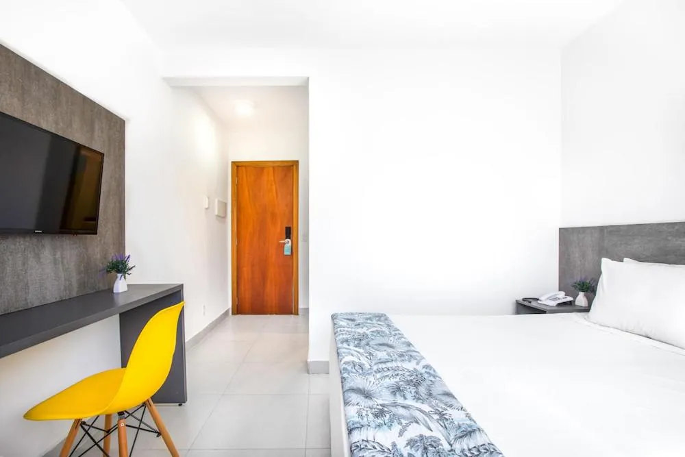 Bed in Hotel Cajueiro Guarujá