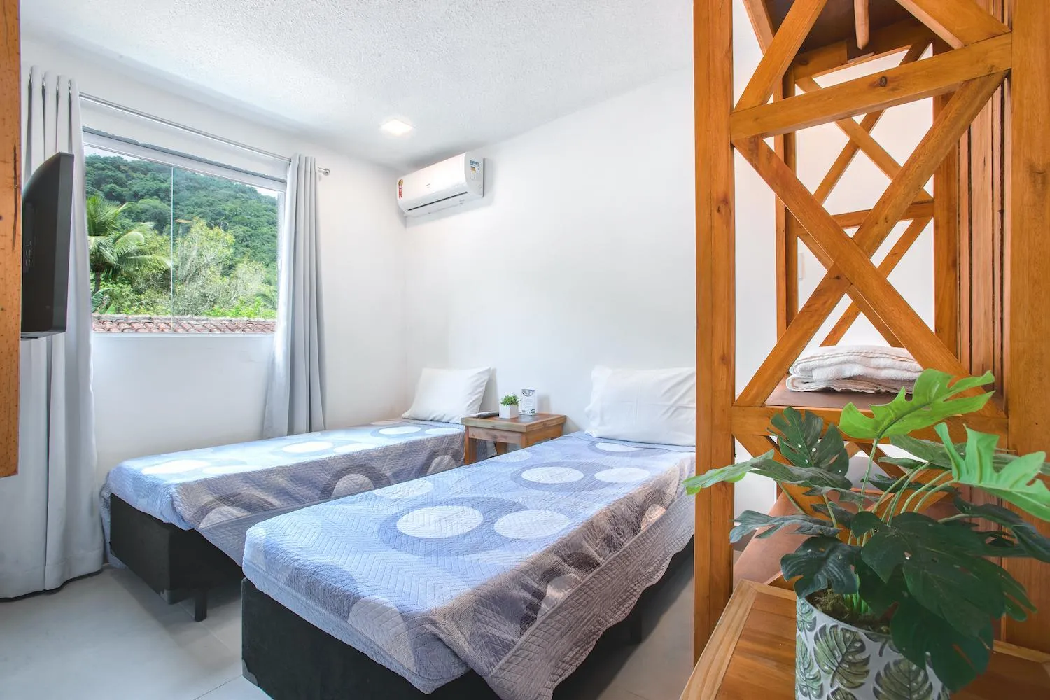 Bed in Hotel Cajueiro Guarujá