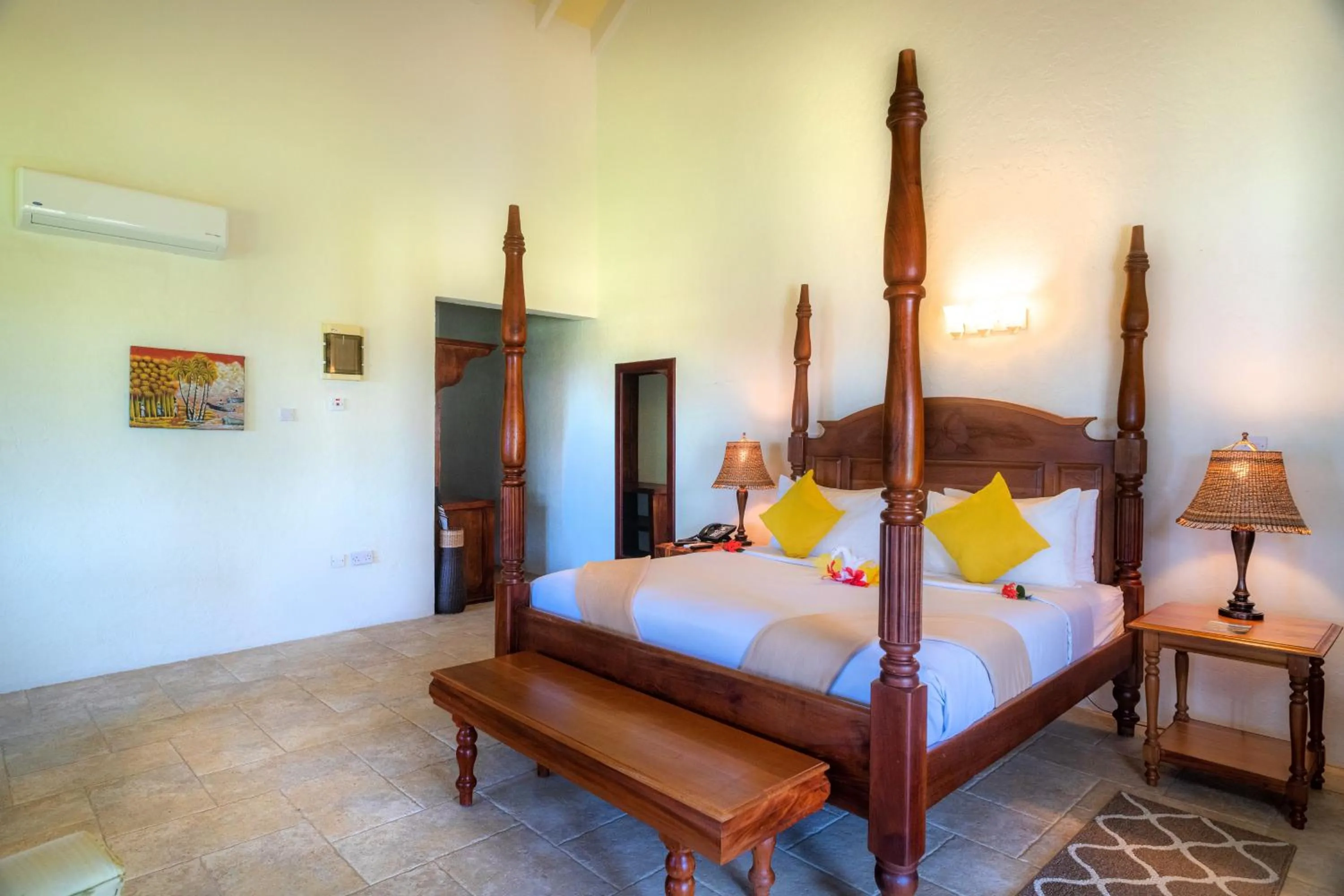 Bed in Rosalie Bay Eco Resort & Spa