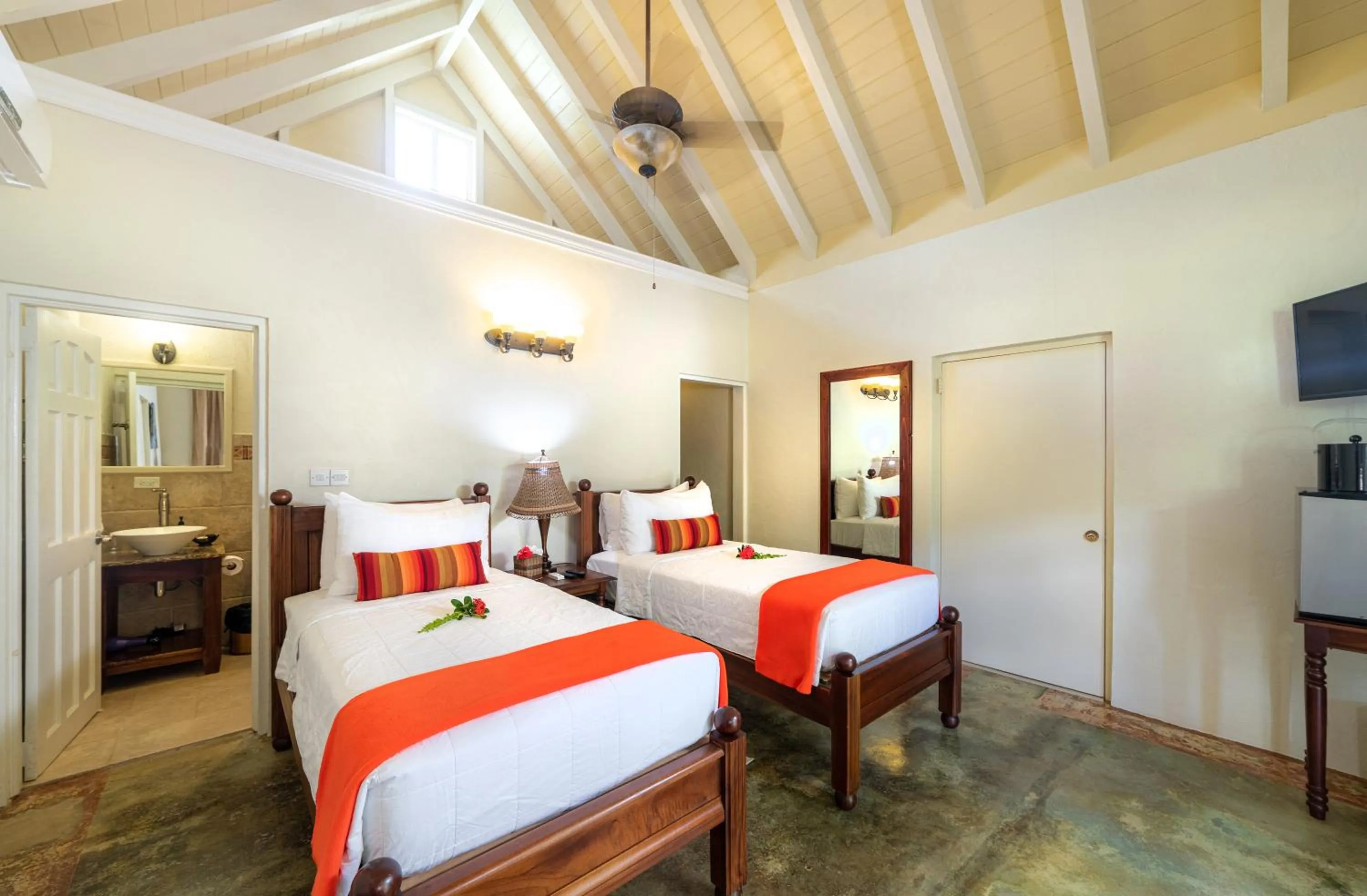 Bed in Rosalie Bay Eco Resort & Spa