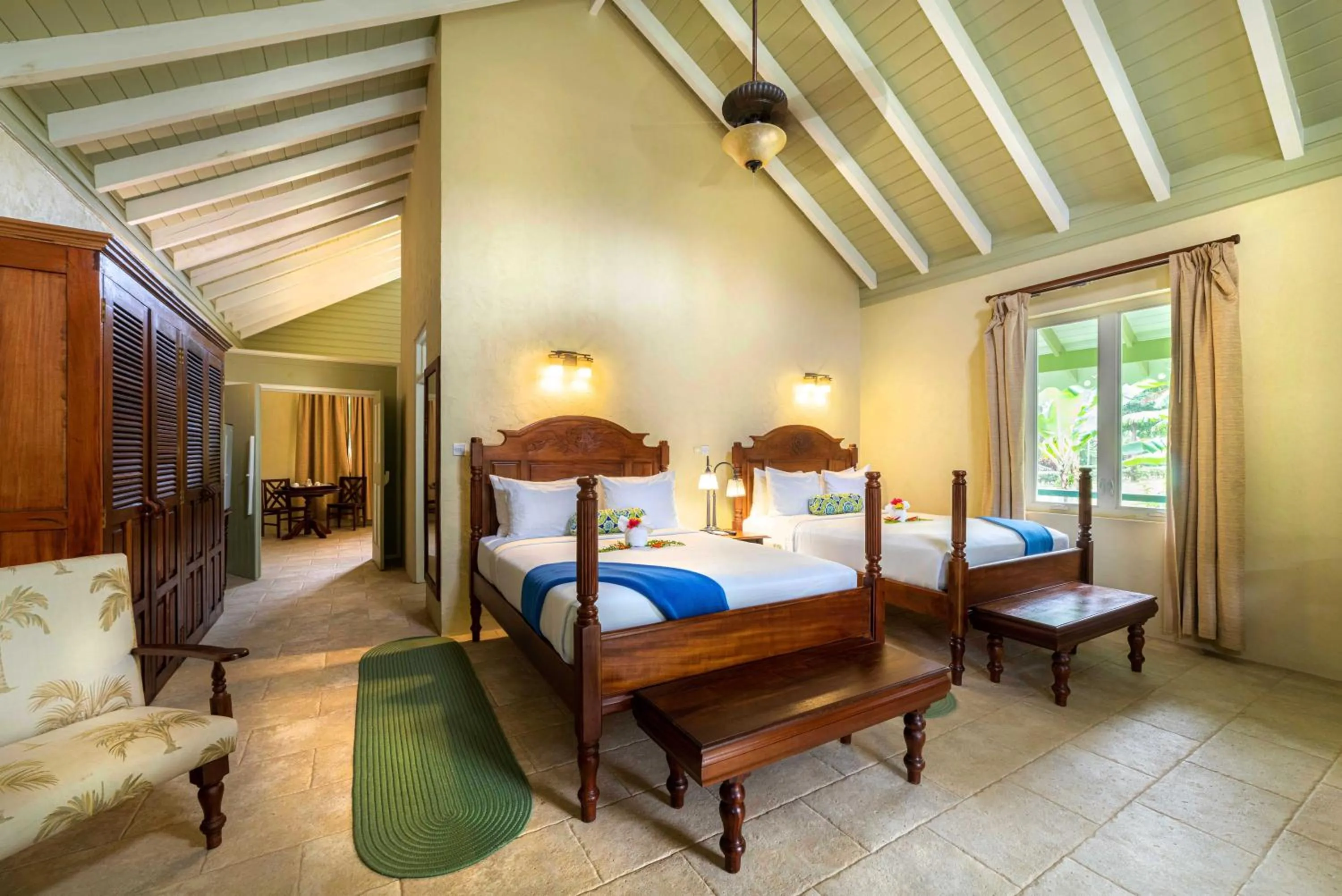 Bed in Rosalie Bay Eco Resort & Spa