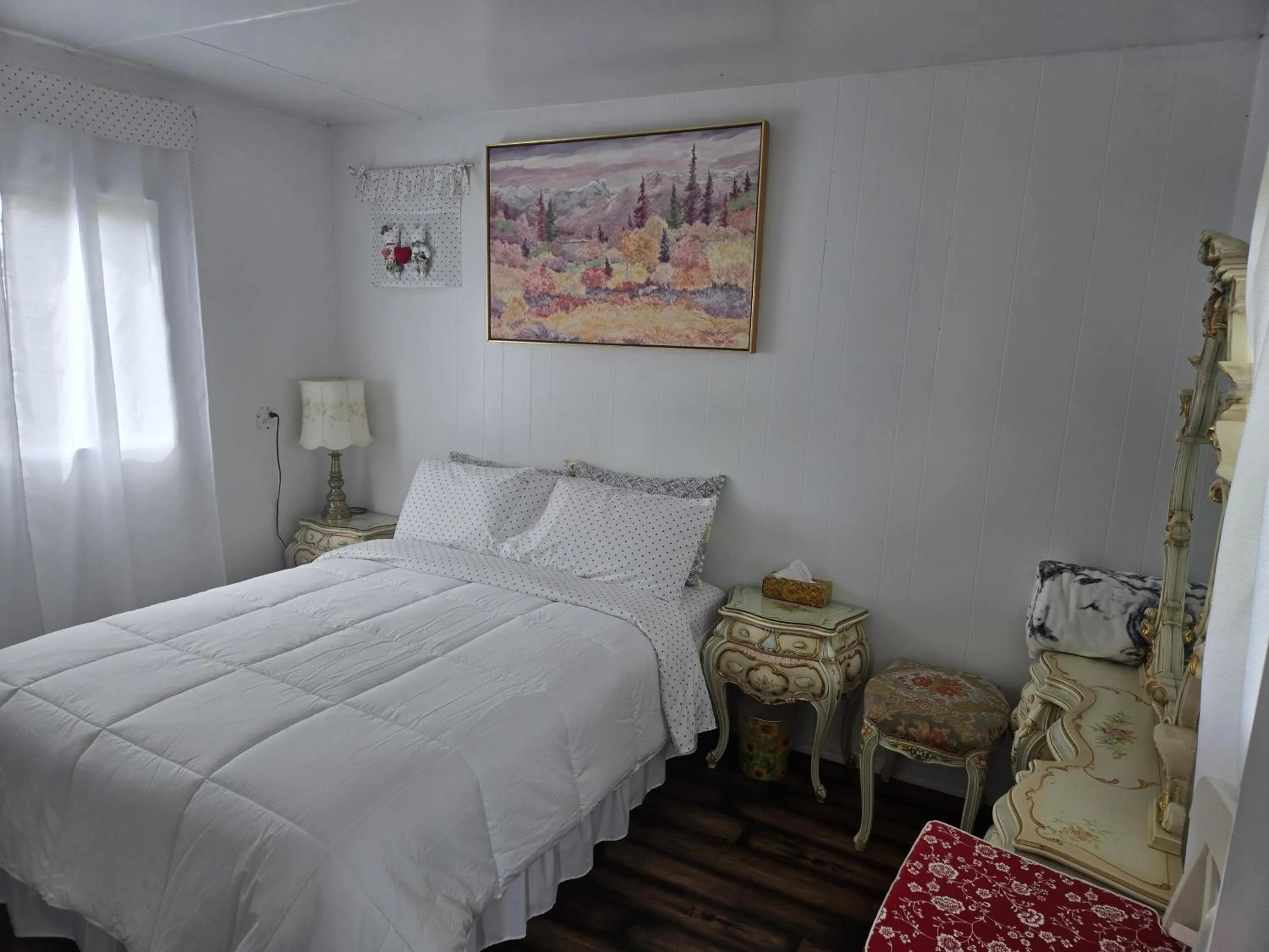 Bed in Blue River Campgrounds & Cabin-public washroom