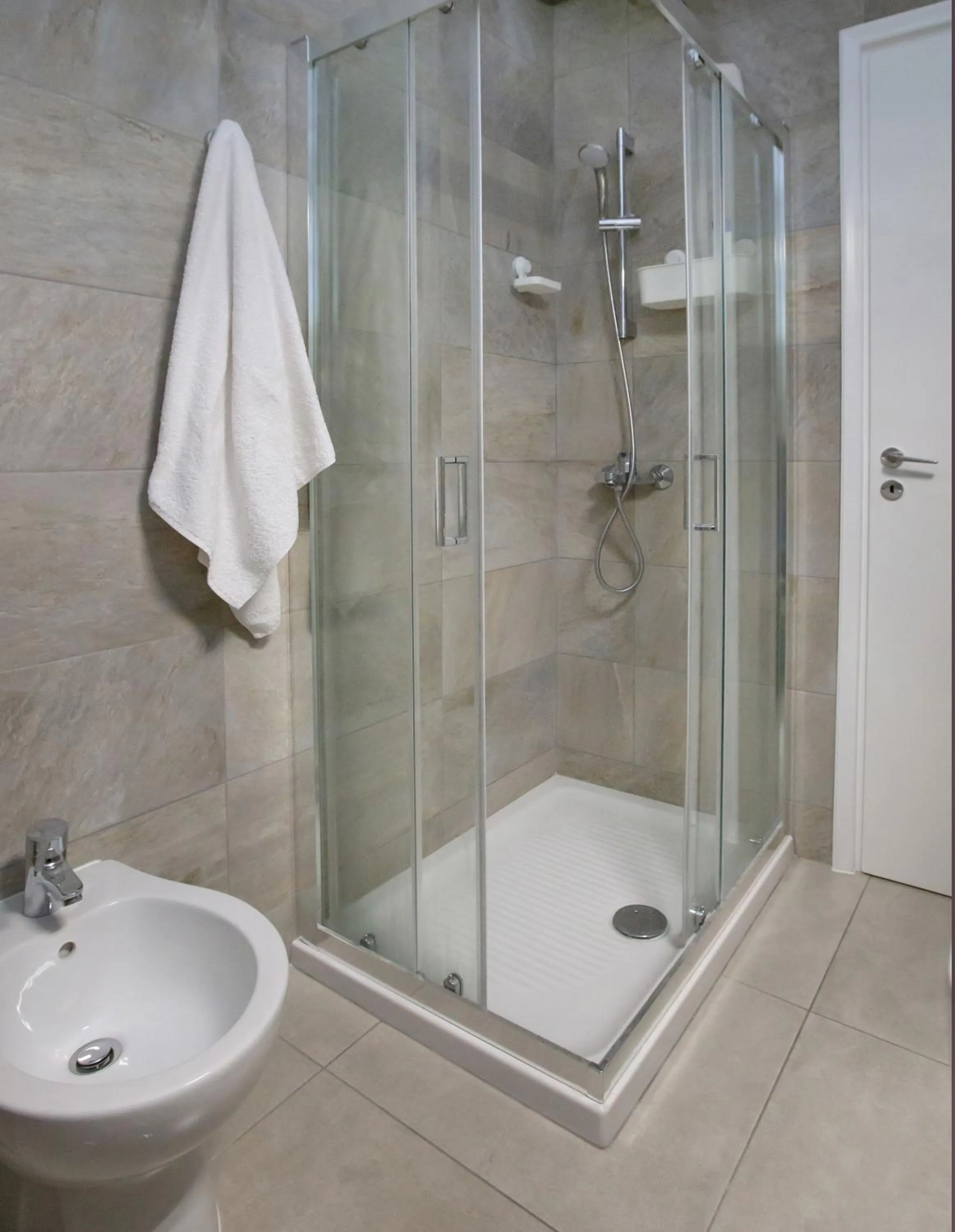 Bathroom in Isora Apartment by GHH