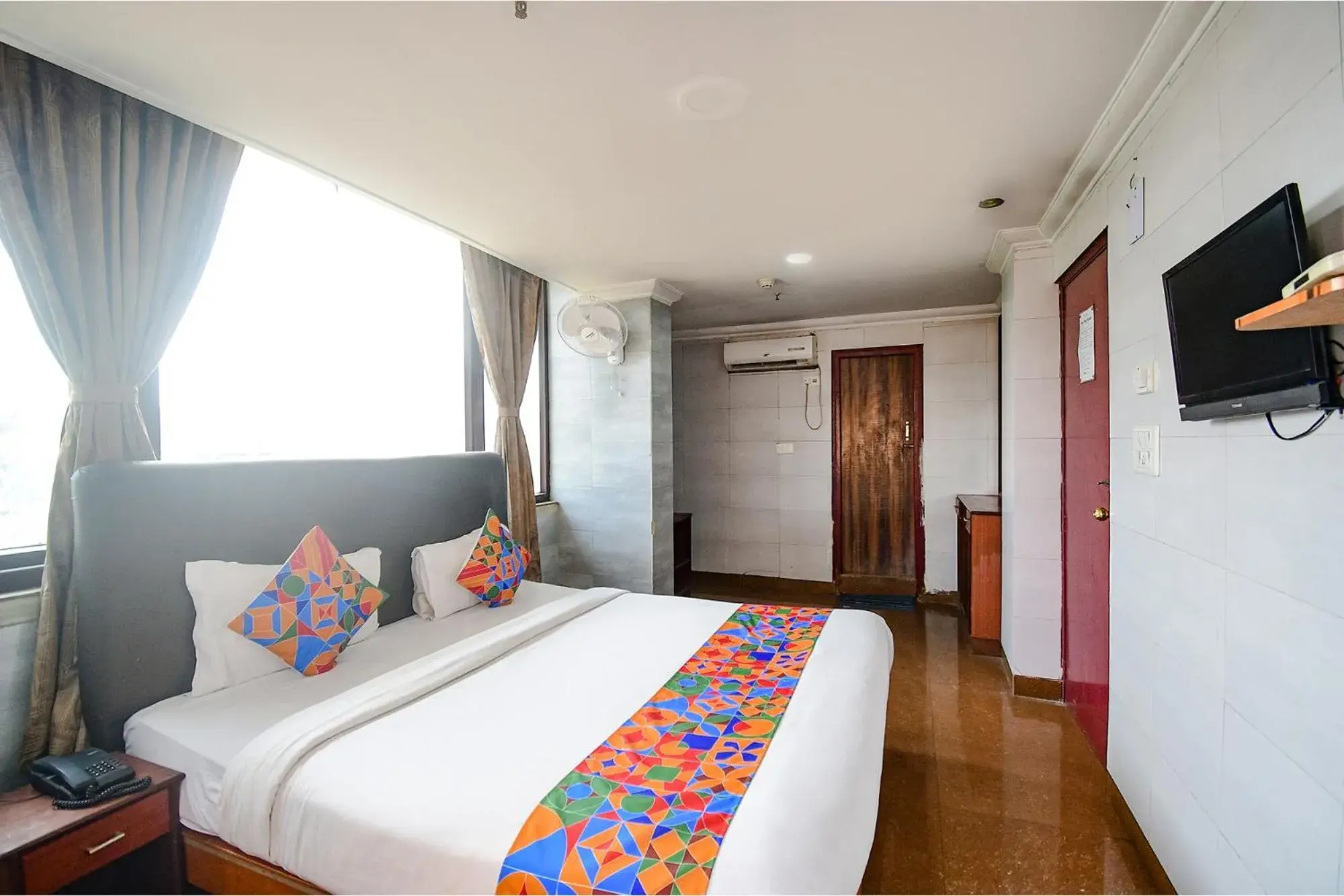 Deluxe Room - single occupancy in FabHotel Raj Darbar Deluxe Room - single occupancy in FabHotel Raj Darbar