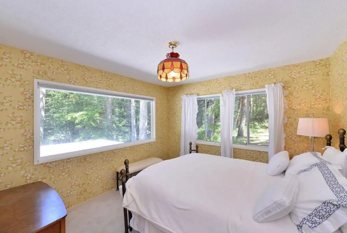 Bed in Pacific Coast Beach House by EMR Vacation Rentals