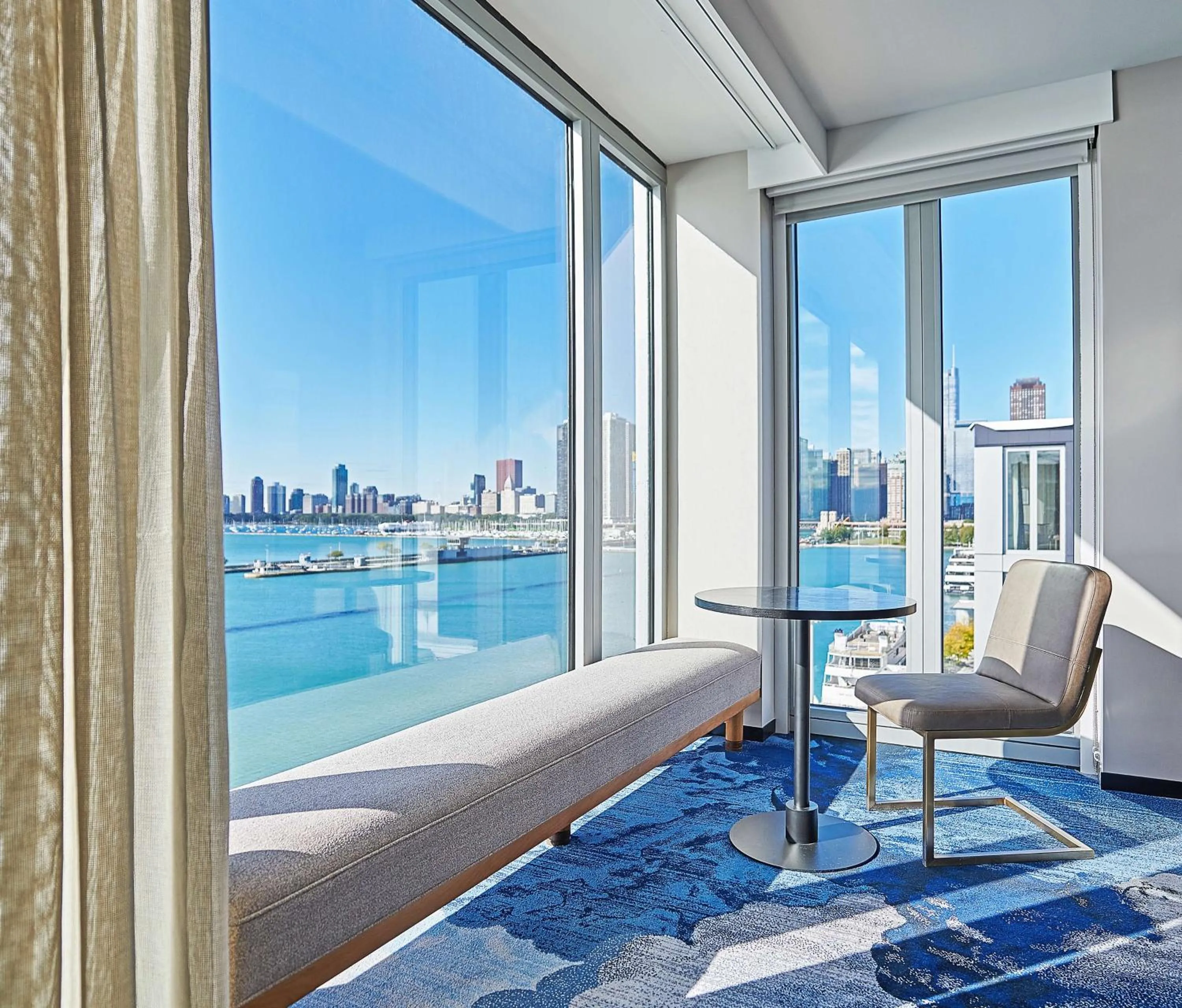 Living room in Sable At Navy Pier Chicago, Curio Collection By Hilton