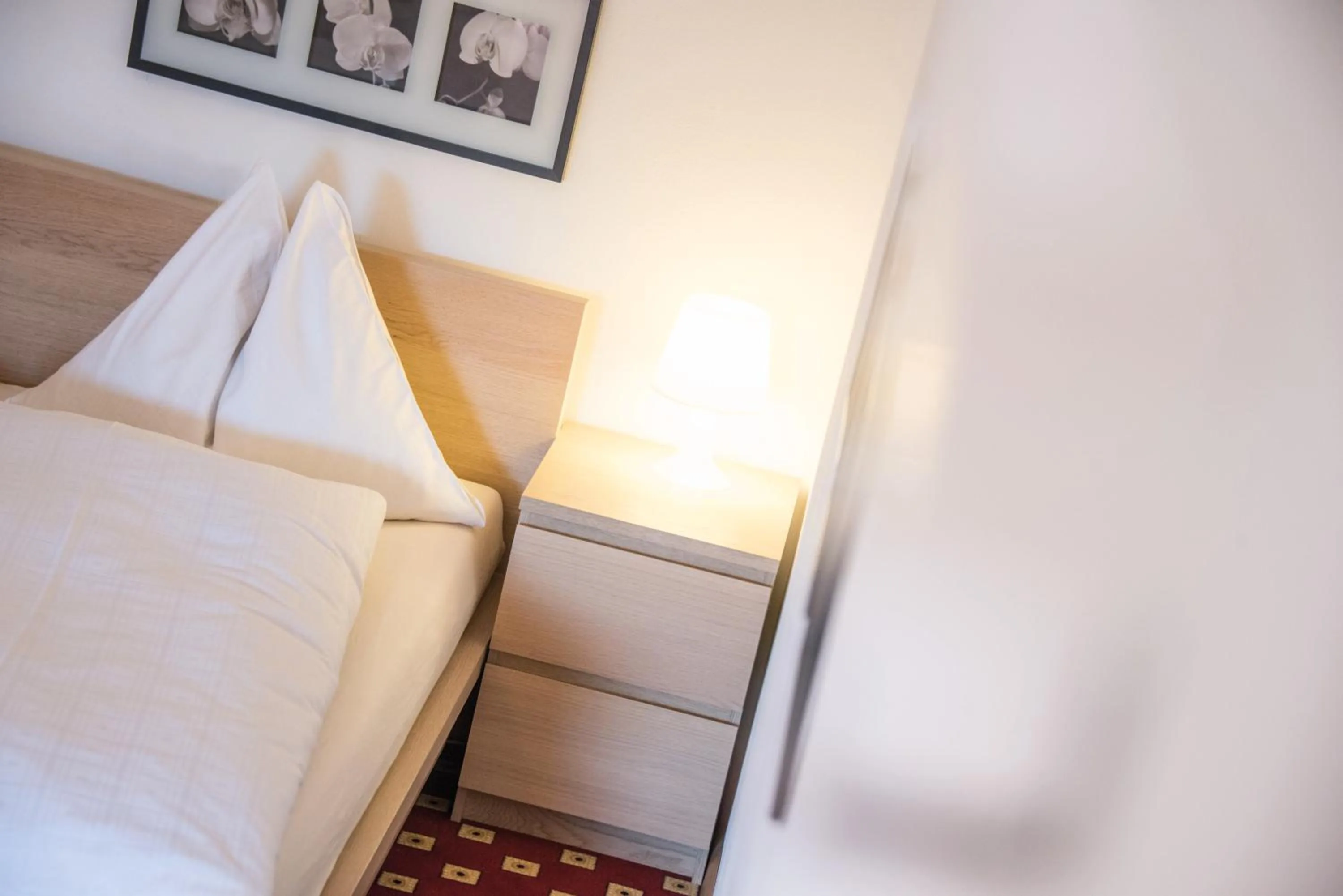 Bed in Apparthotel Feldhof - Living and Bistro