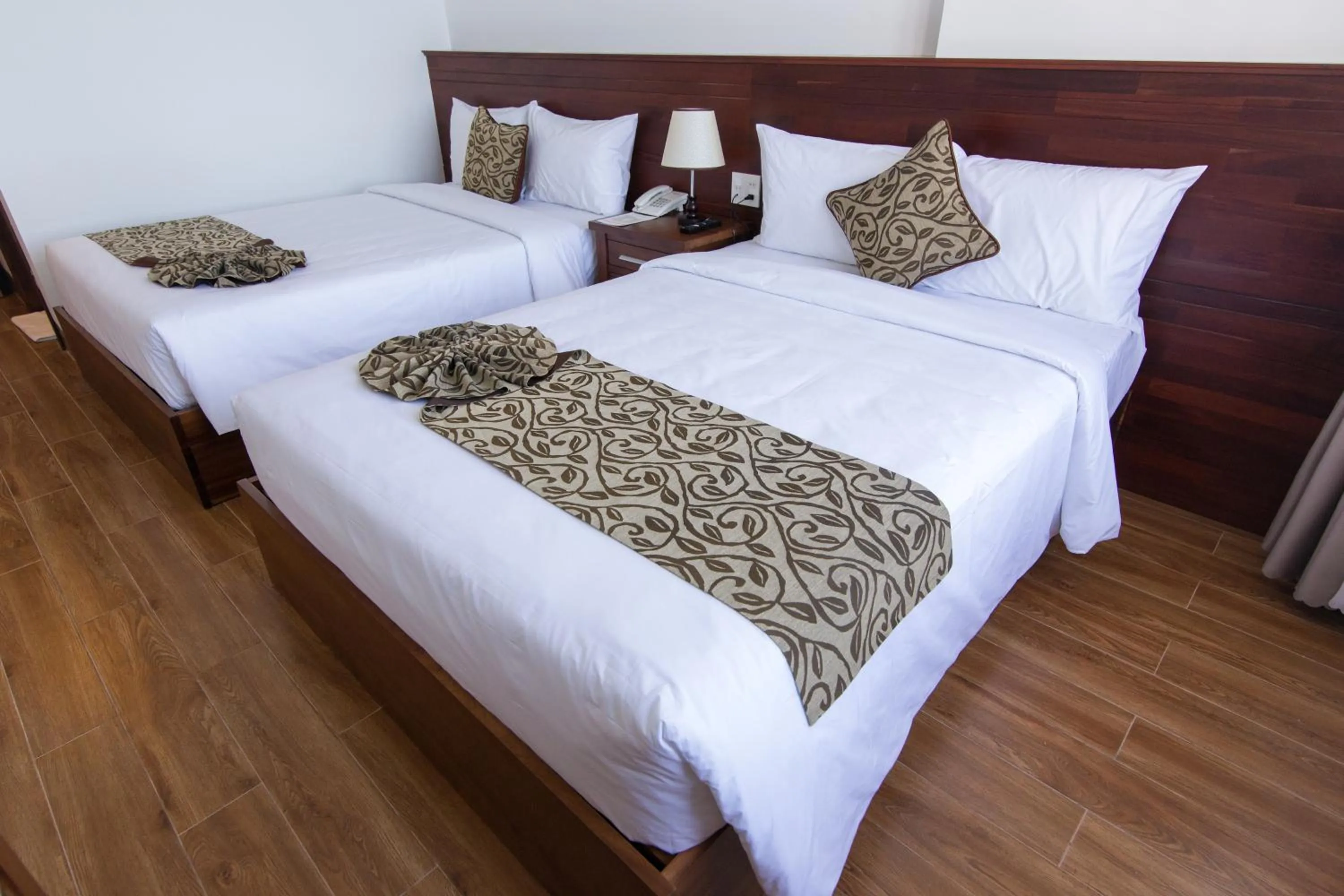 Bed in Ocean View Quy Nhon Hotel