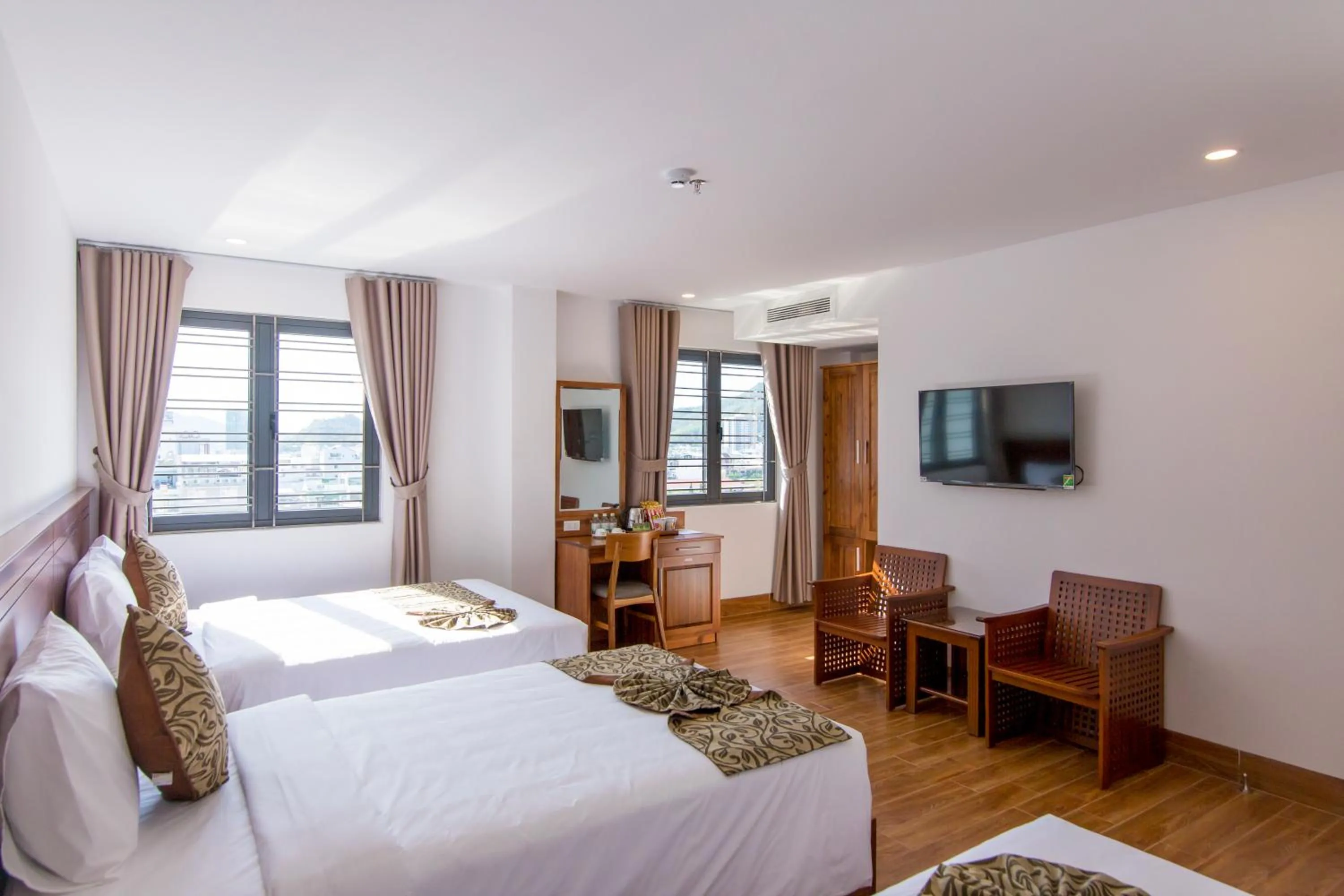 Photo of the whole room, Bed in Ocean View Quy Nhon Hotel