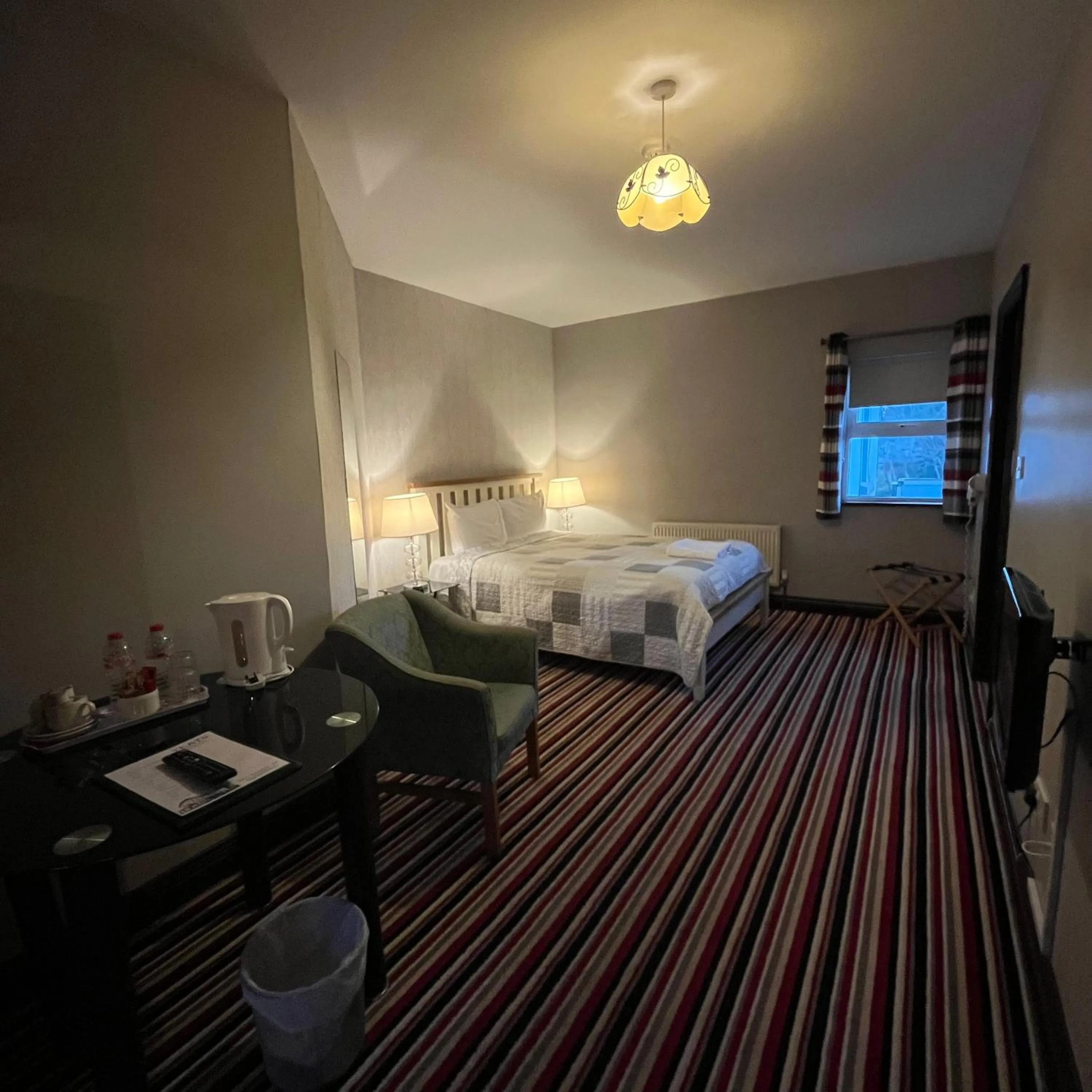 Bed in The Yeats County Inn Hotel