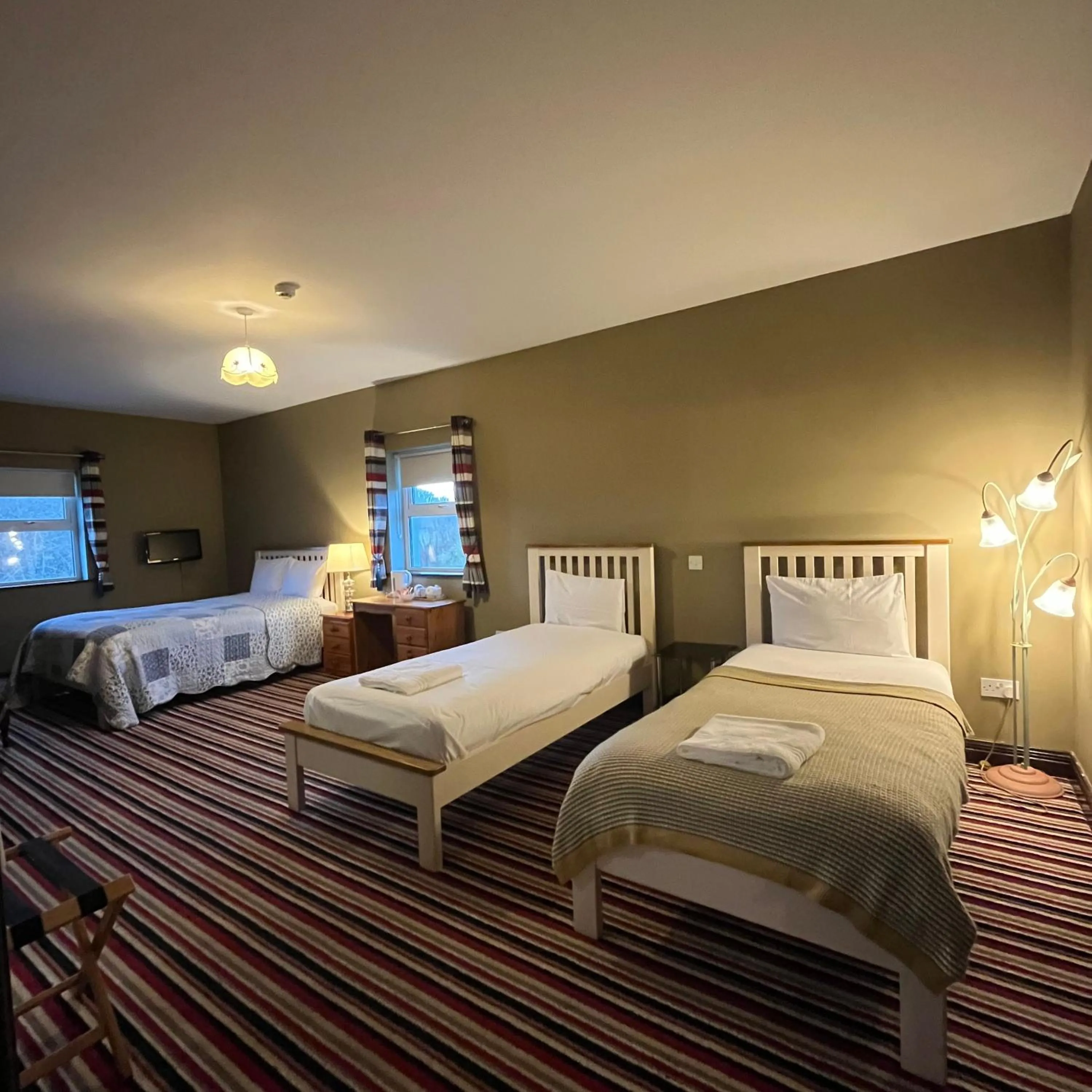 Bed in The Yeats County Inn Hotel