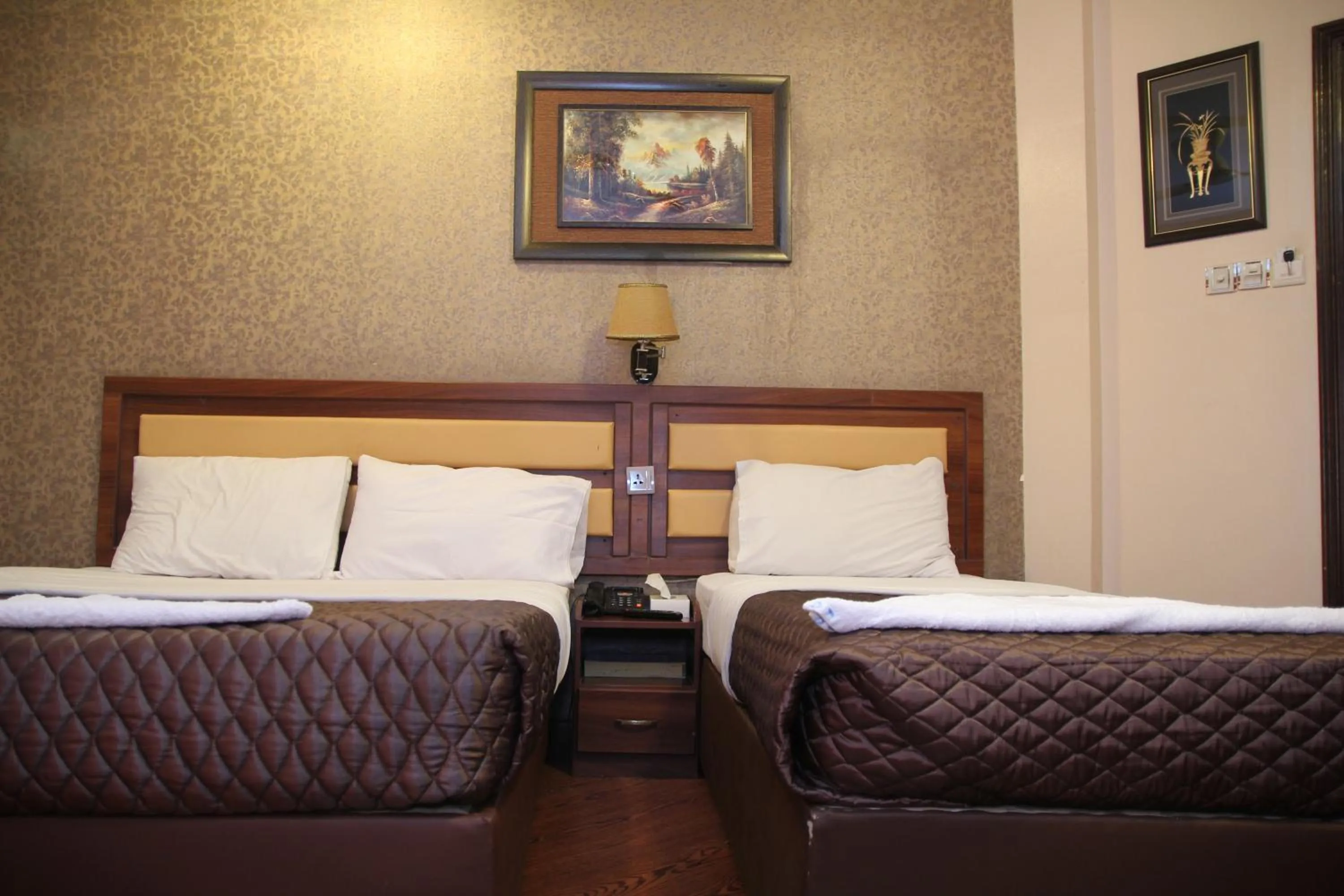 Bed in Downtown Hotel