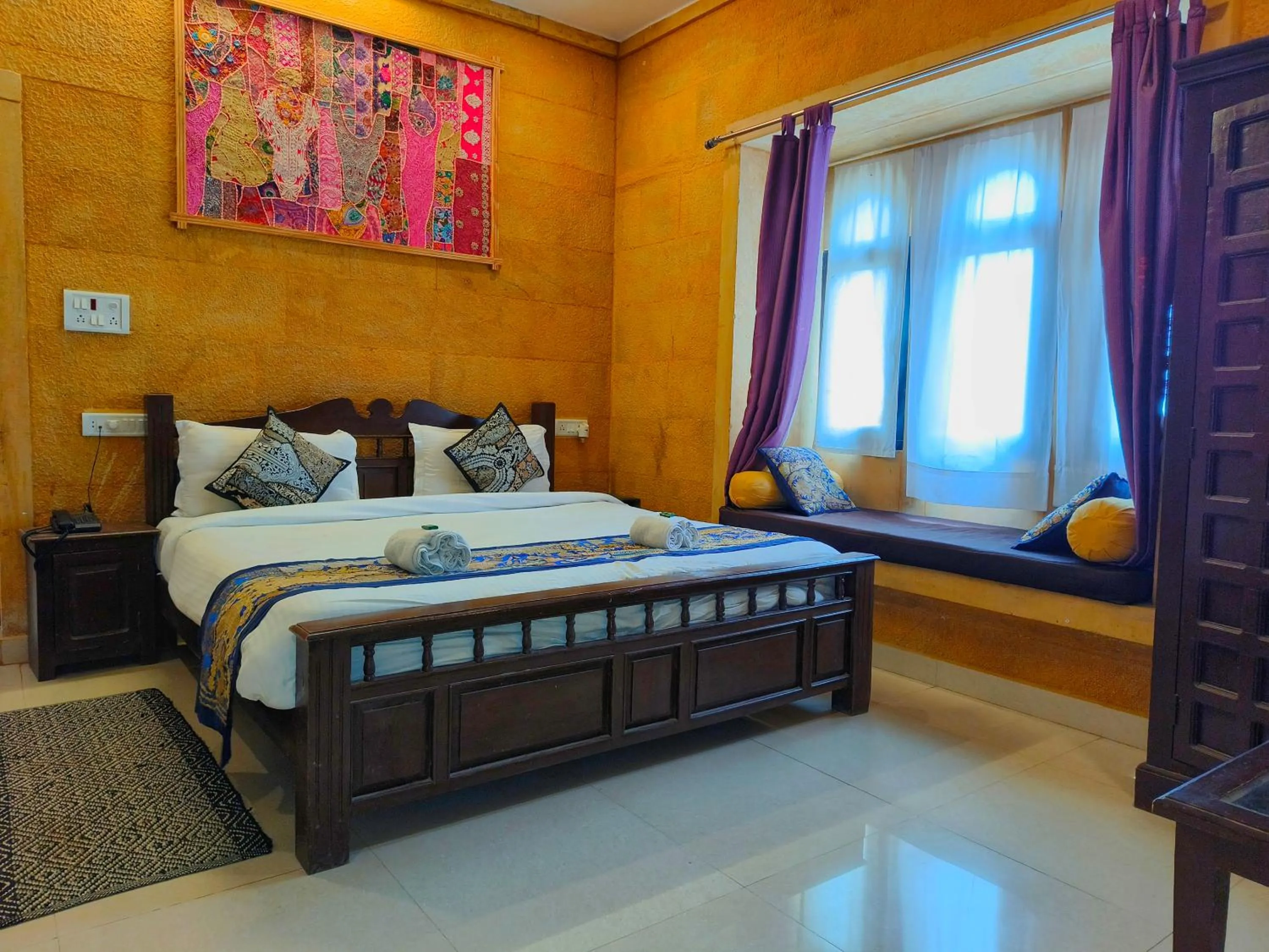 Bed in Hotel Royal Heritage