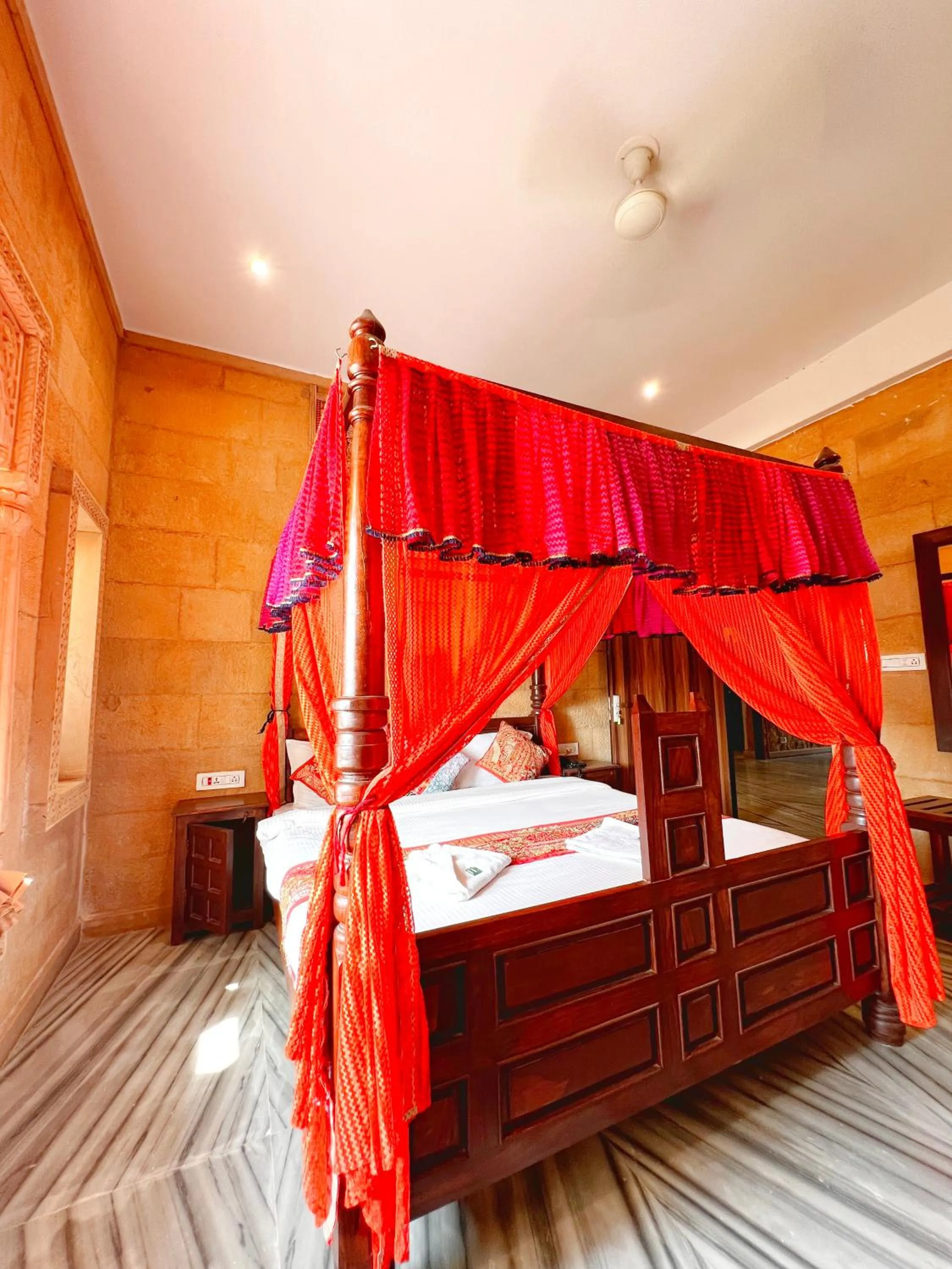 Bed in Hotel Royal Heritage