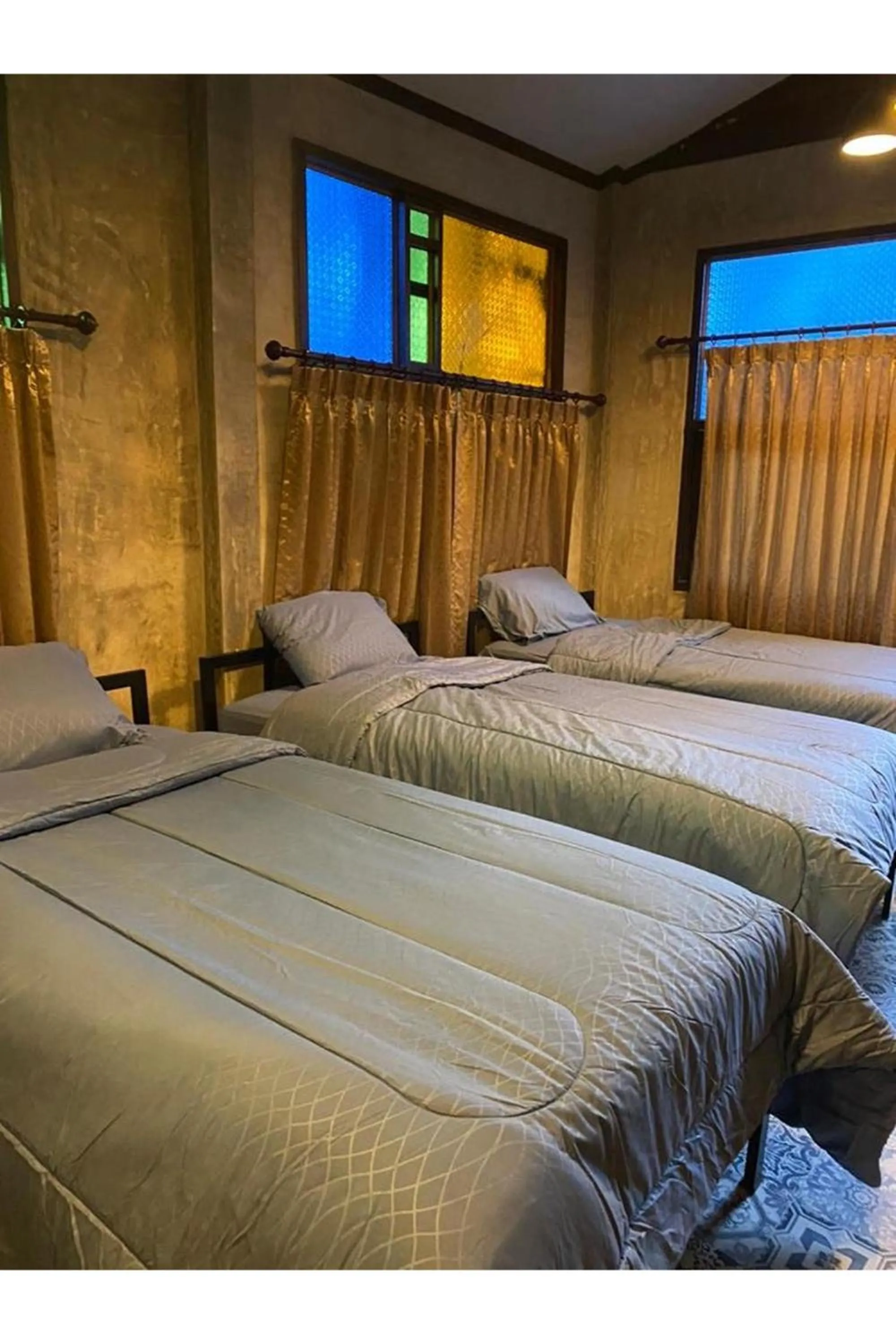 Bed in Nokkamin Home Chiang Dao