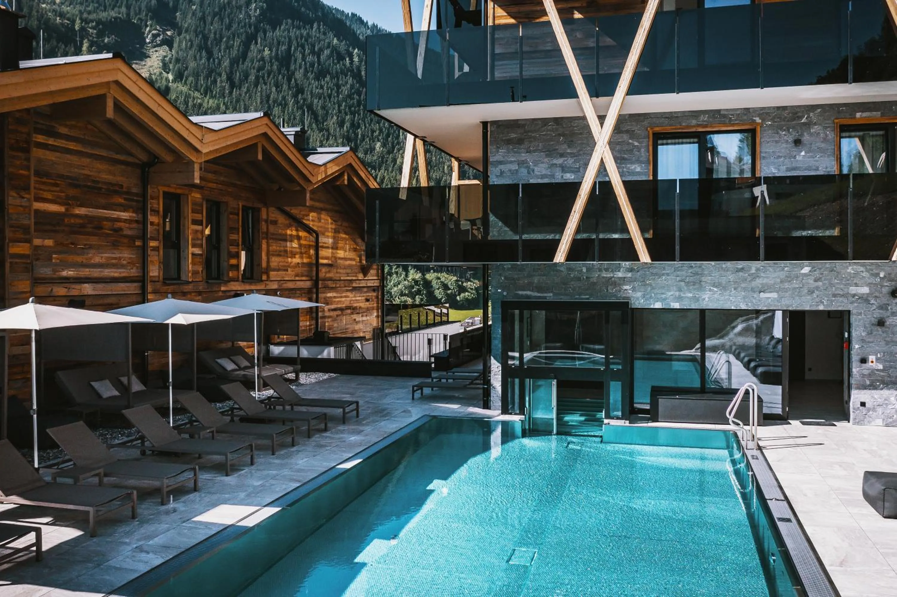 Swimming pool in GLEMM by AvenidA Superior Hotel & Residences