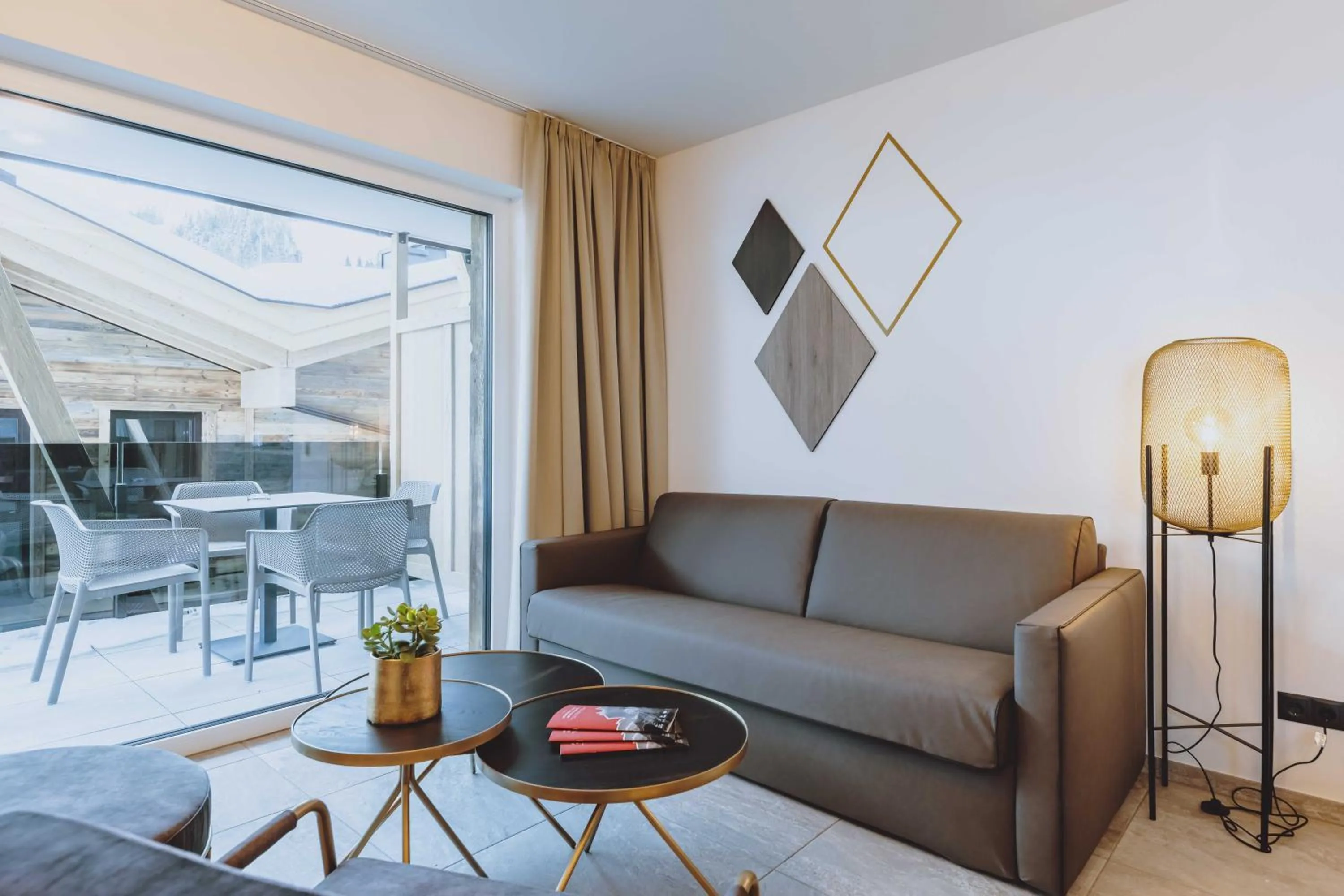 Seating area in GLEMM by AvenidA Superior Hotel & Residences