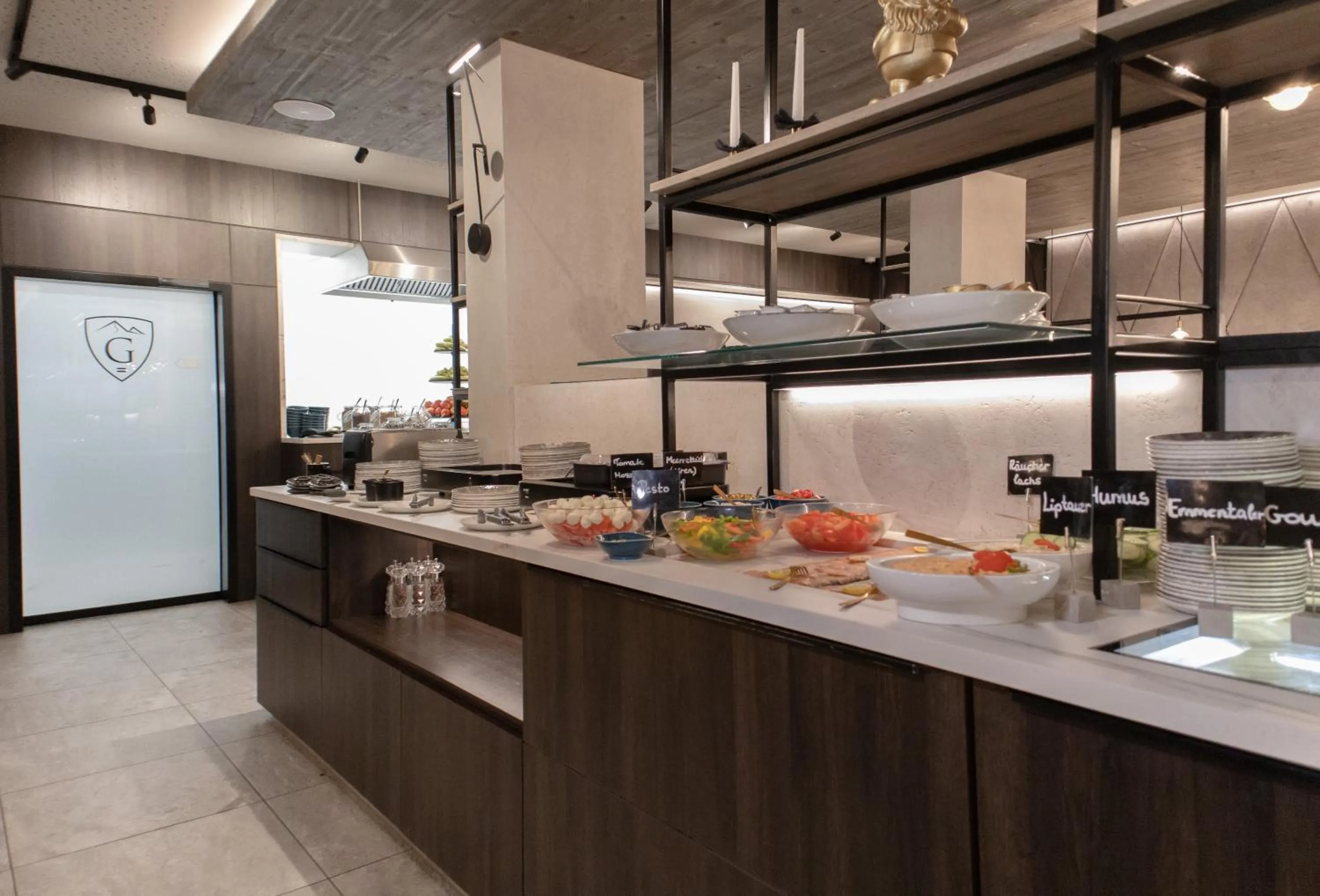 Buffet breakfast in GLEMM by AvenidA Superior Hotel & Residences