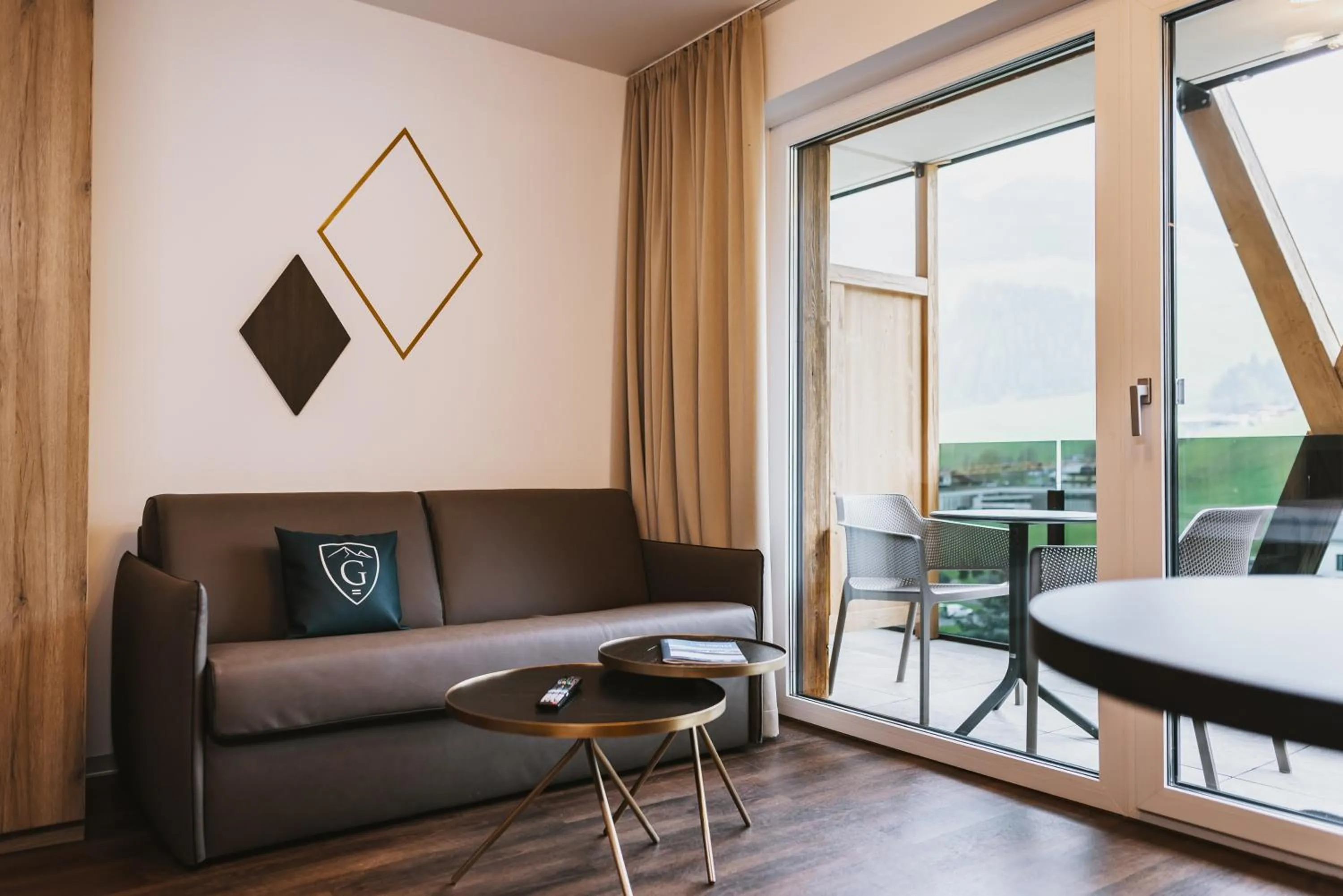 Seating area in GLEMM by AvenidA Superior Hotel & Residences