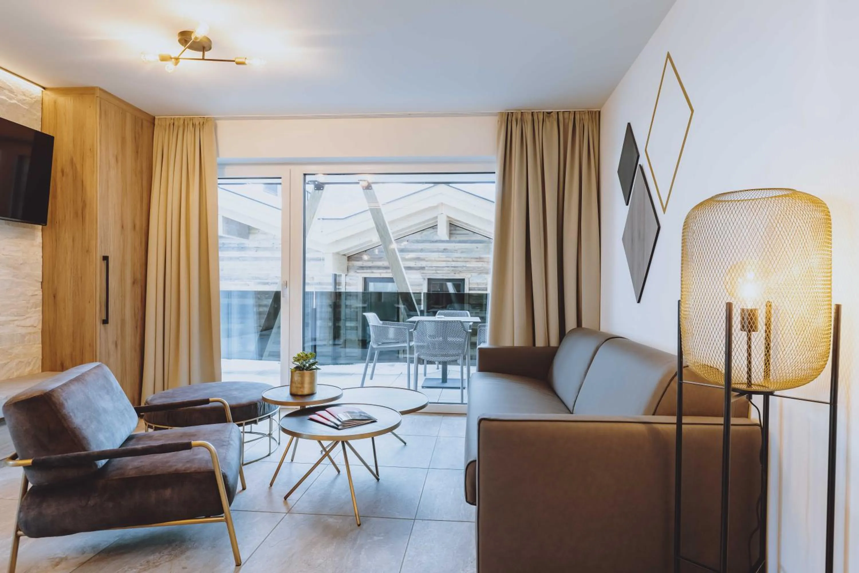 Living room in GLEMM by AvenidA Superior Hotel & Residences