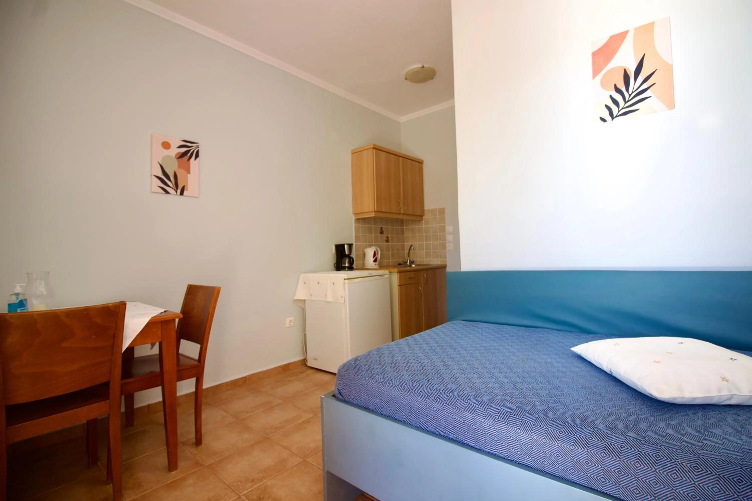 Kitchen or kitchenette, Bed in Aggelina's Apartments