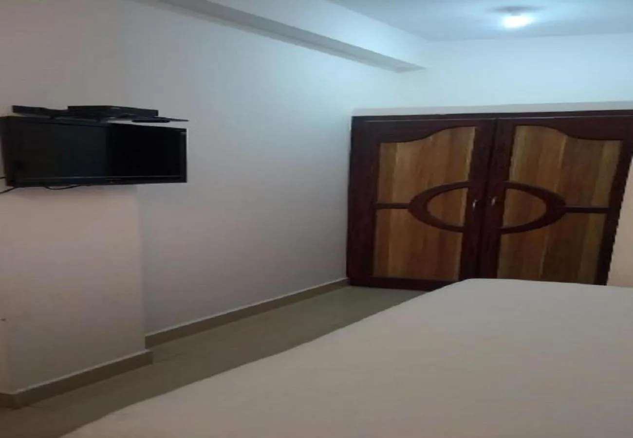 Bedroom in Haleemas Residency
