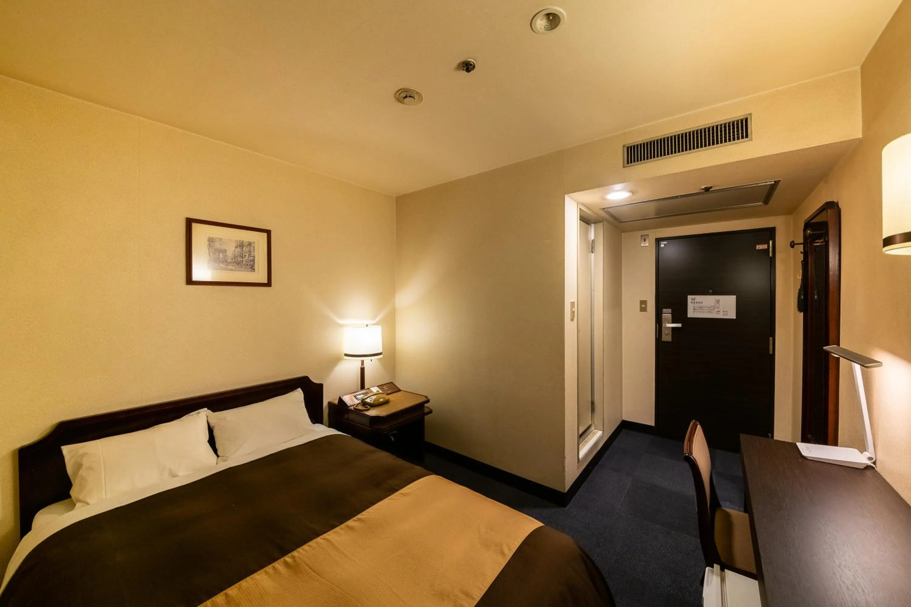 Bed in Kyoto Central Inn