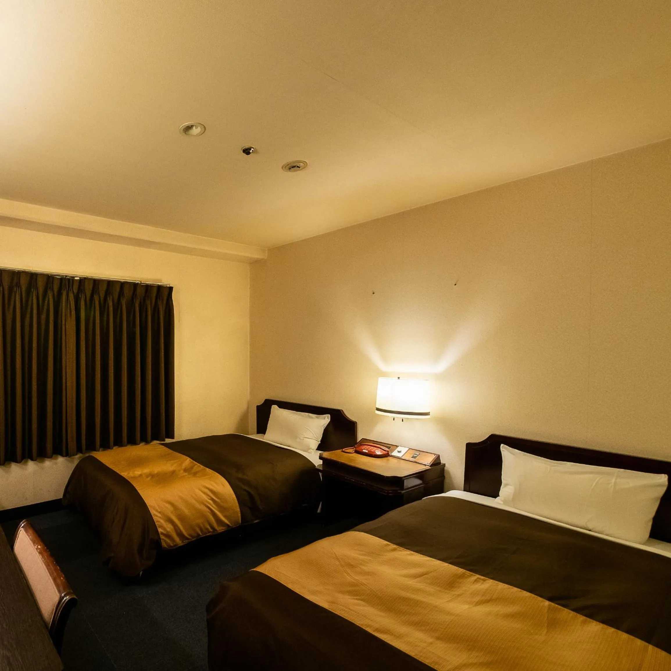 Bed in Kyoto Central Inn