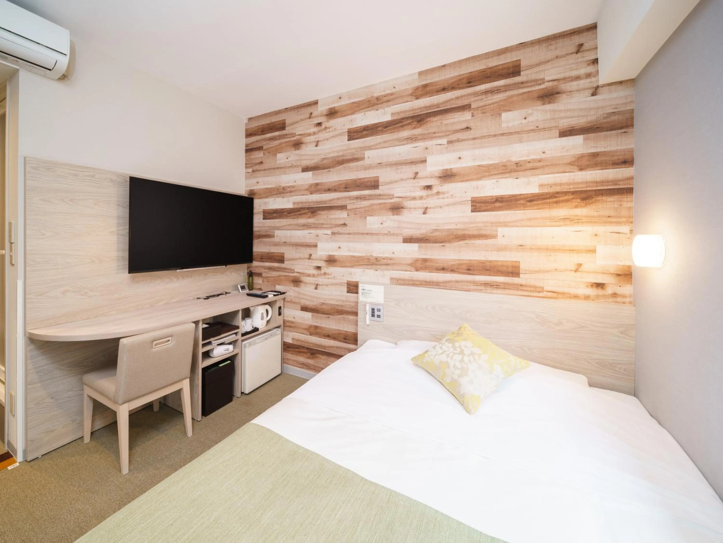 Bed in Super Hotel Sendai Hirose Dori