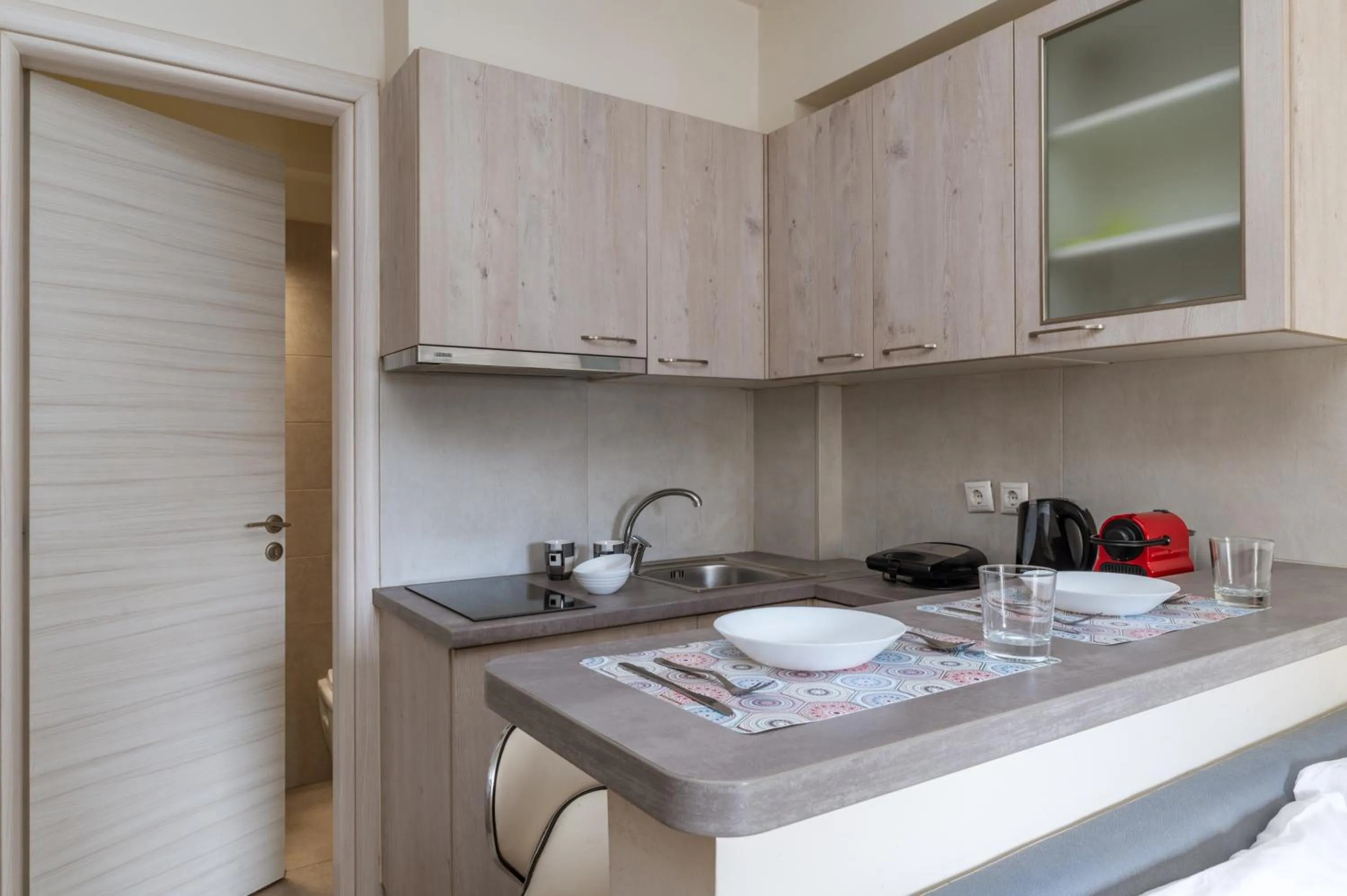 Kitchen or kitchenette in Elvita Apartments 3