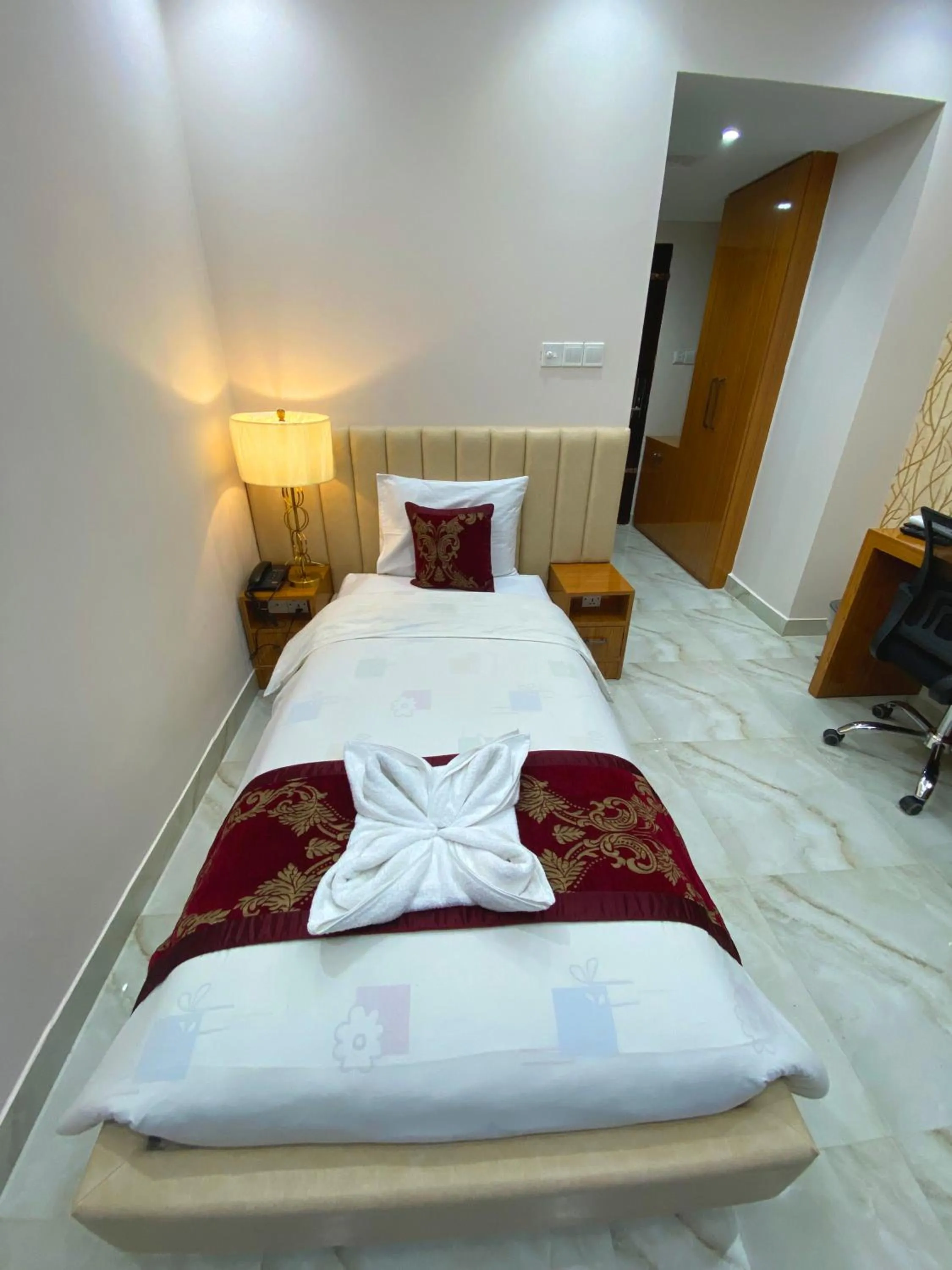 Bed in Hotel Valentino