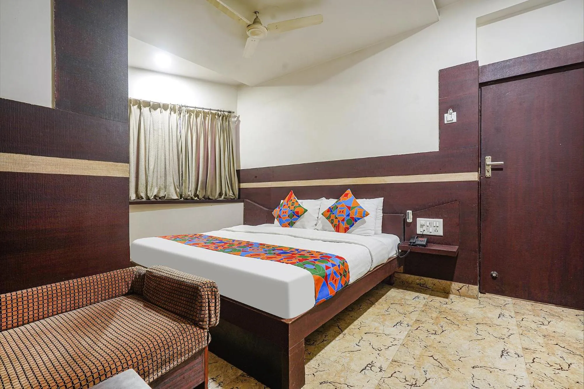 Bed in FabHotel Shravan - Nr Eternity Mall