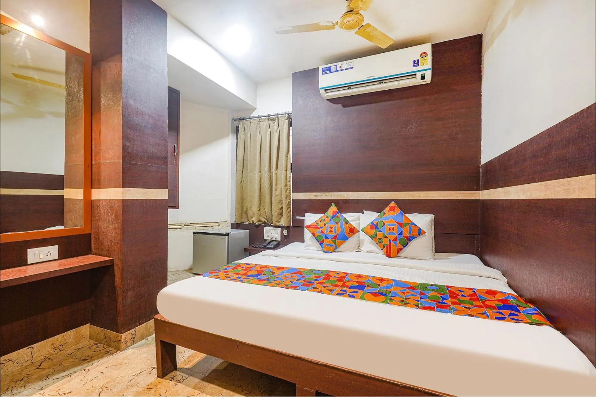 Bed in FabHotel Shravan - Nr Eternity Mall