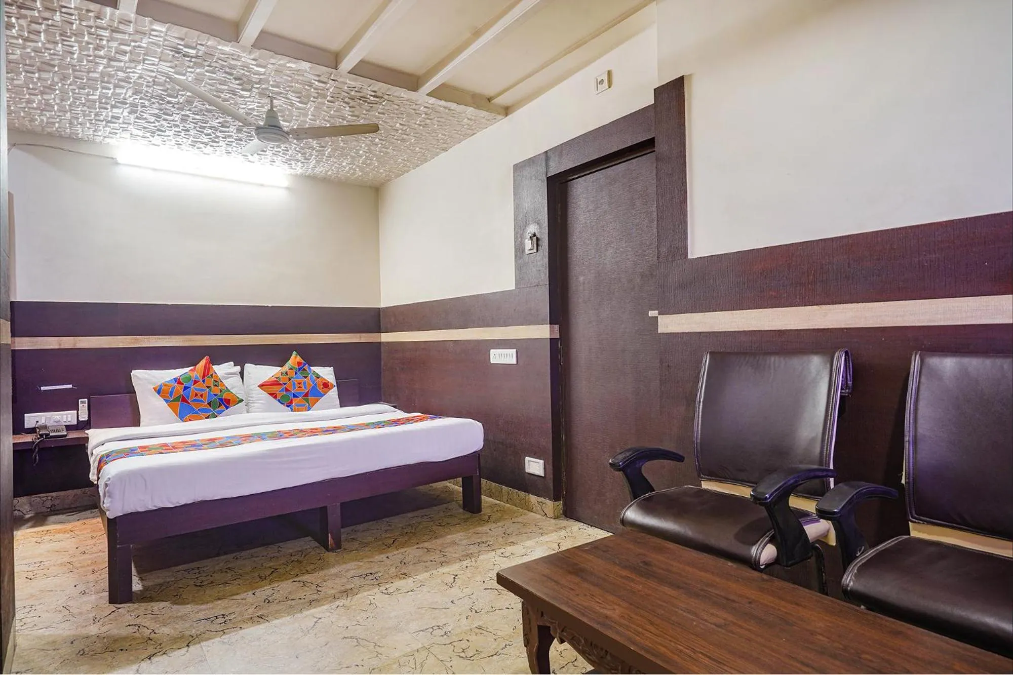 Bed in FabHotel Shravan - Nr Eternity Mall
