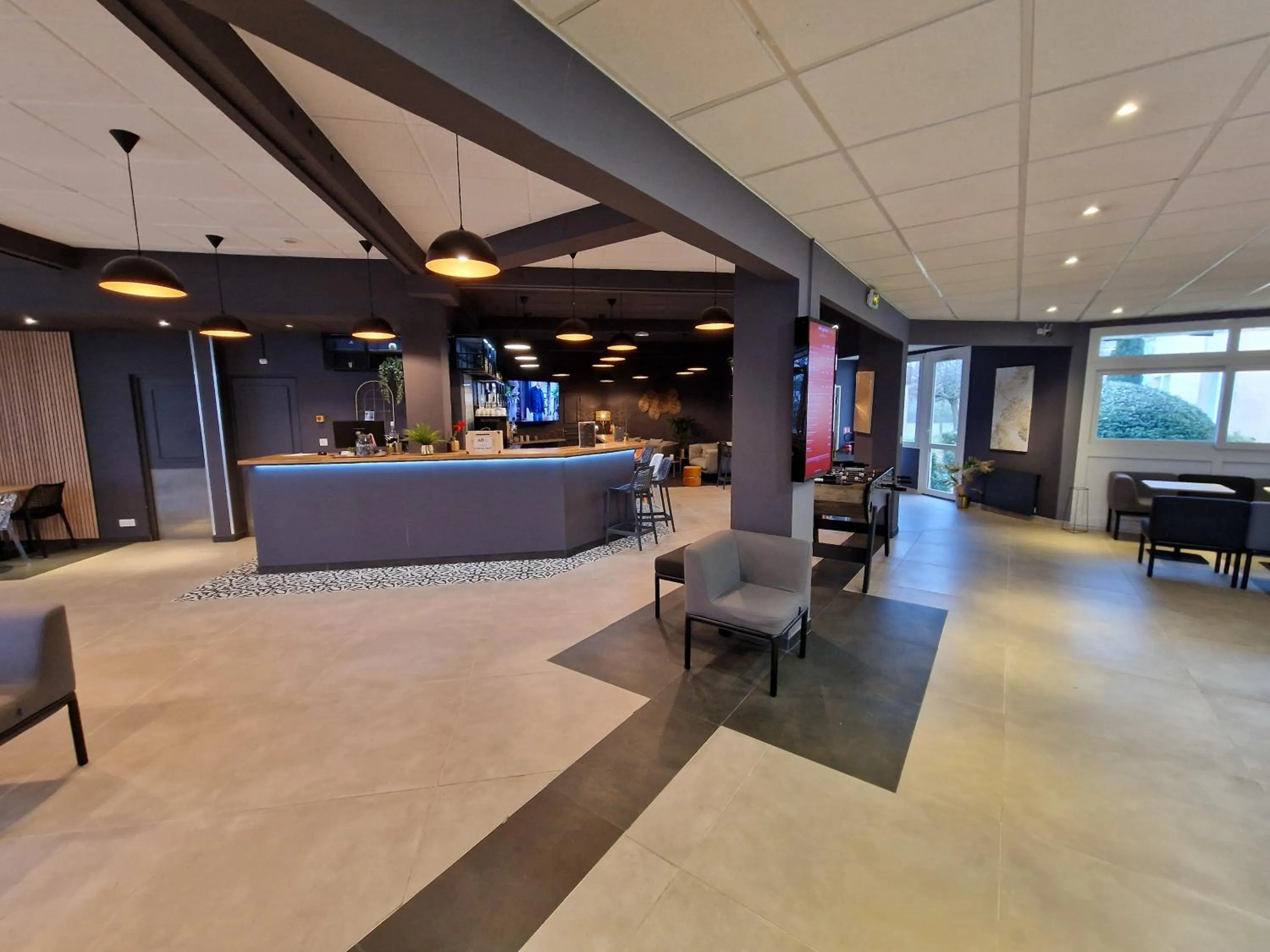Lobby or reception in ibis Rambouillet