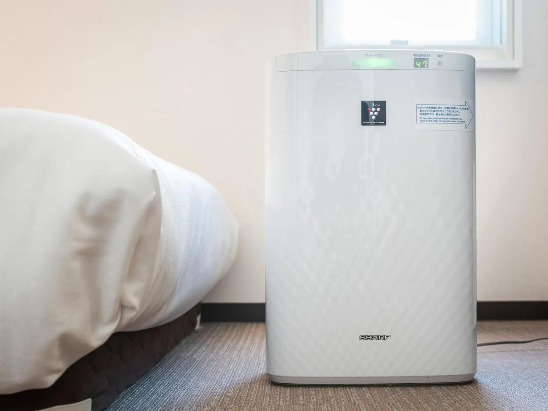 Bed in Super Hotel JR Fujiekimae Kinenkan