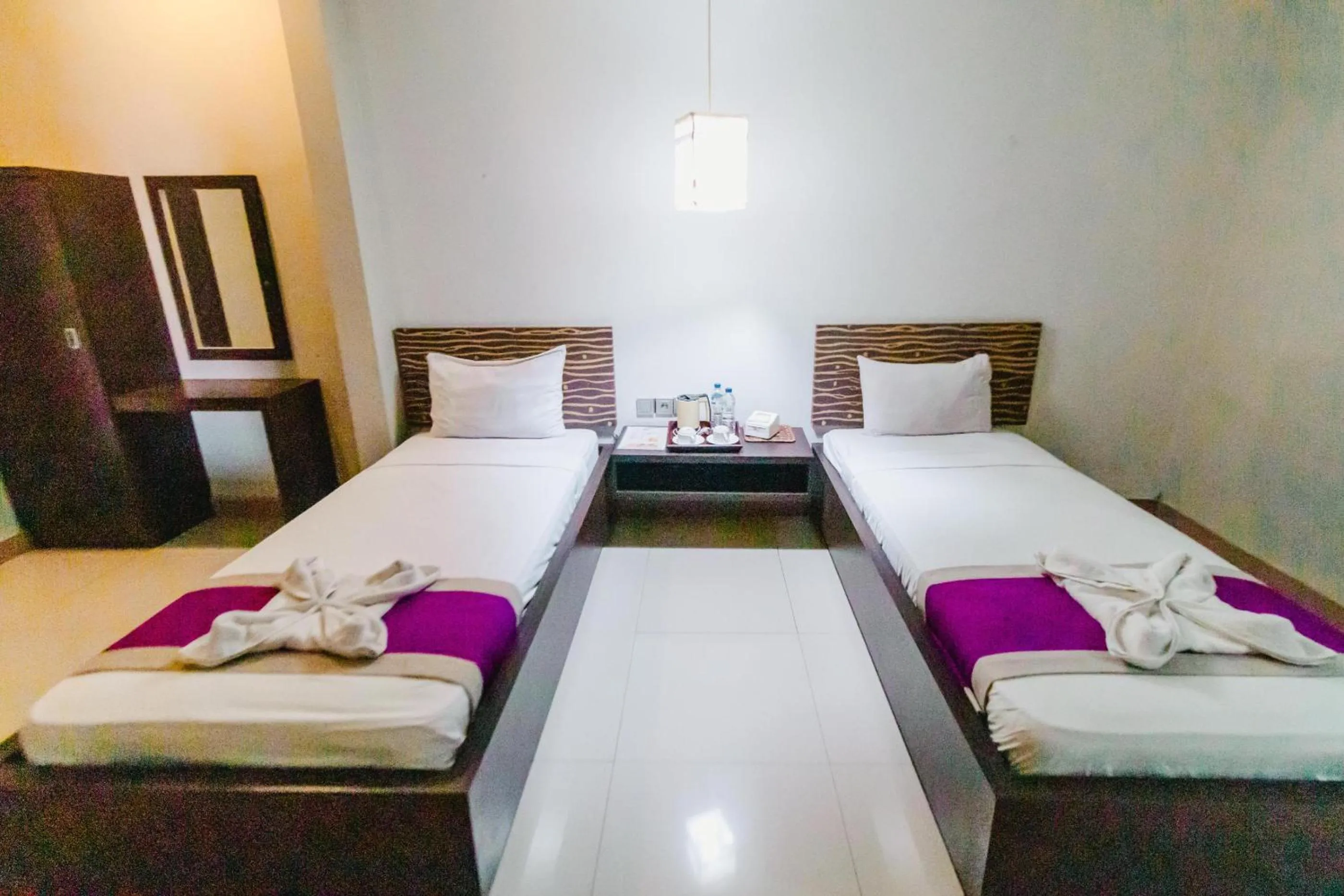Bed in Bidari Hotel Lombok