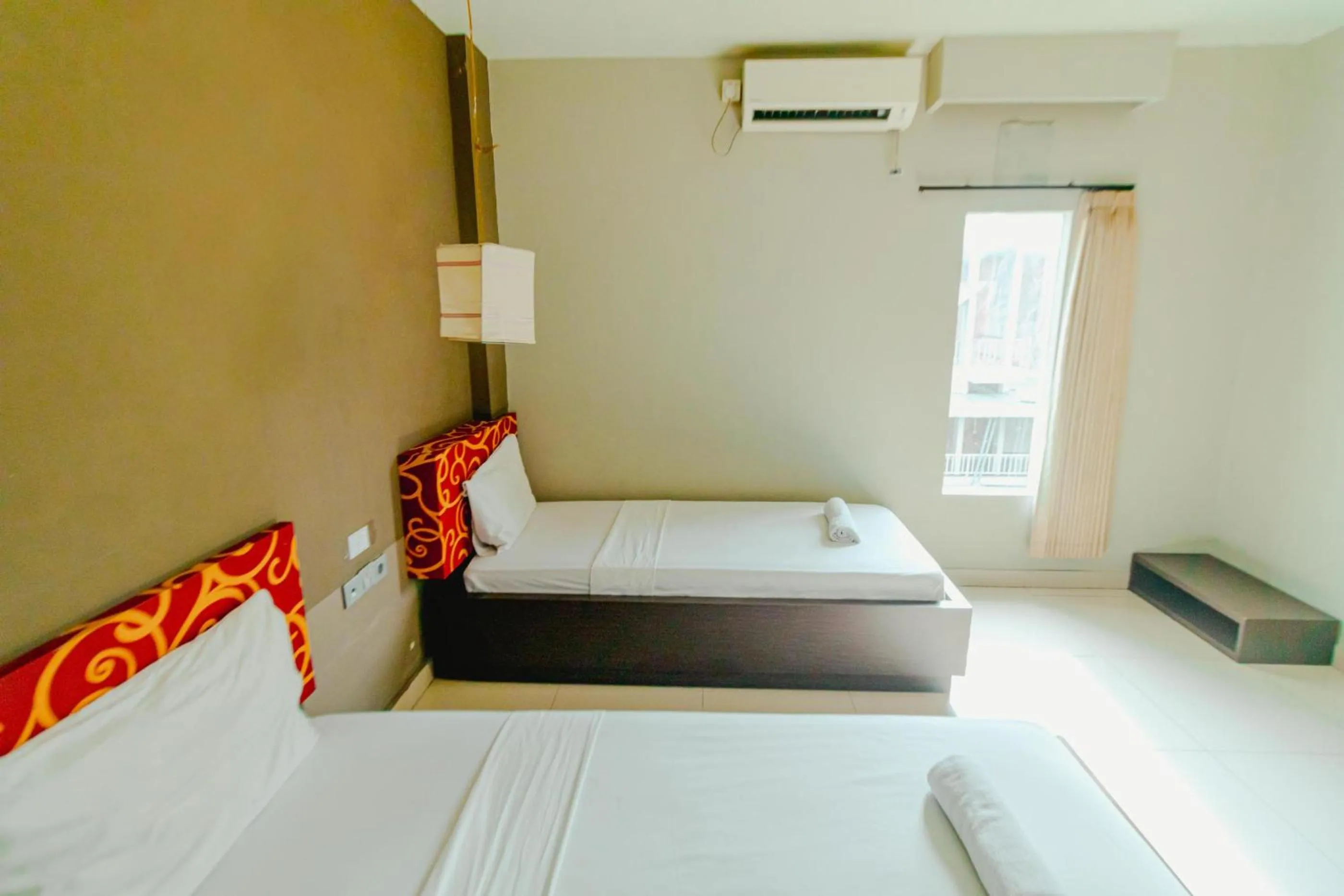 Bed in Bidari Hotel Lombok