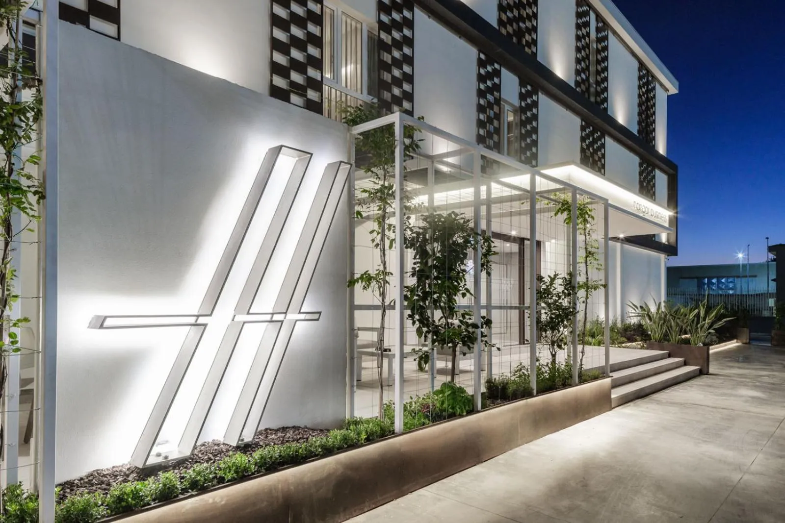 Property logo or sign in Hangar Hotel